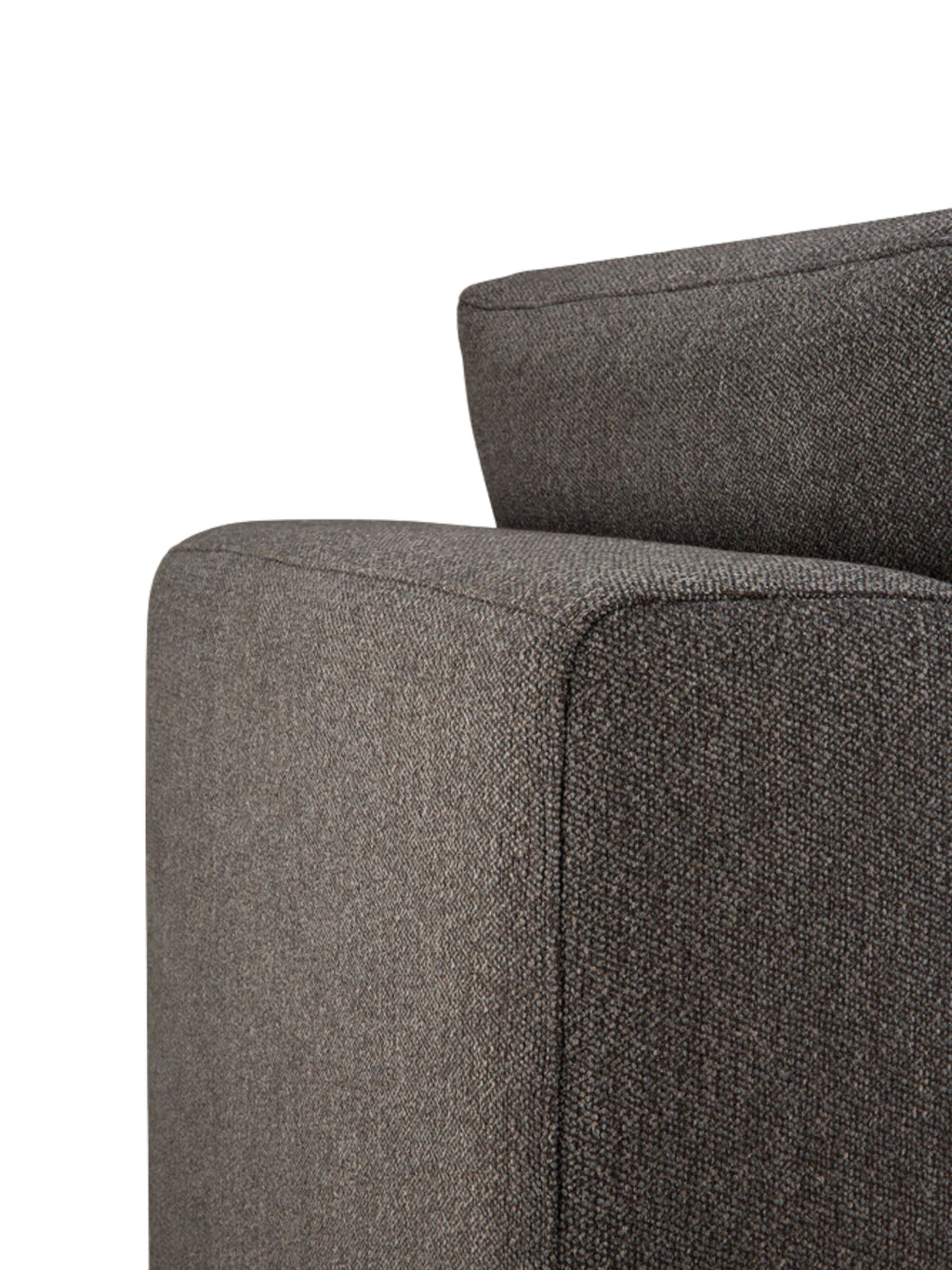 Ethnicraft Mellow Modular Sofa 1-Seater, detail of the armrest and back. The premium dark gray textured fabric with precise stitching showcases the sofa's modern design and exceptional craftsmanship, on white.