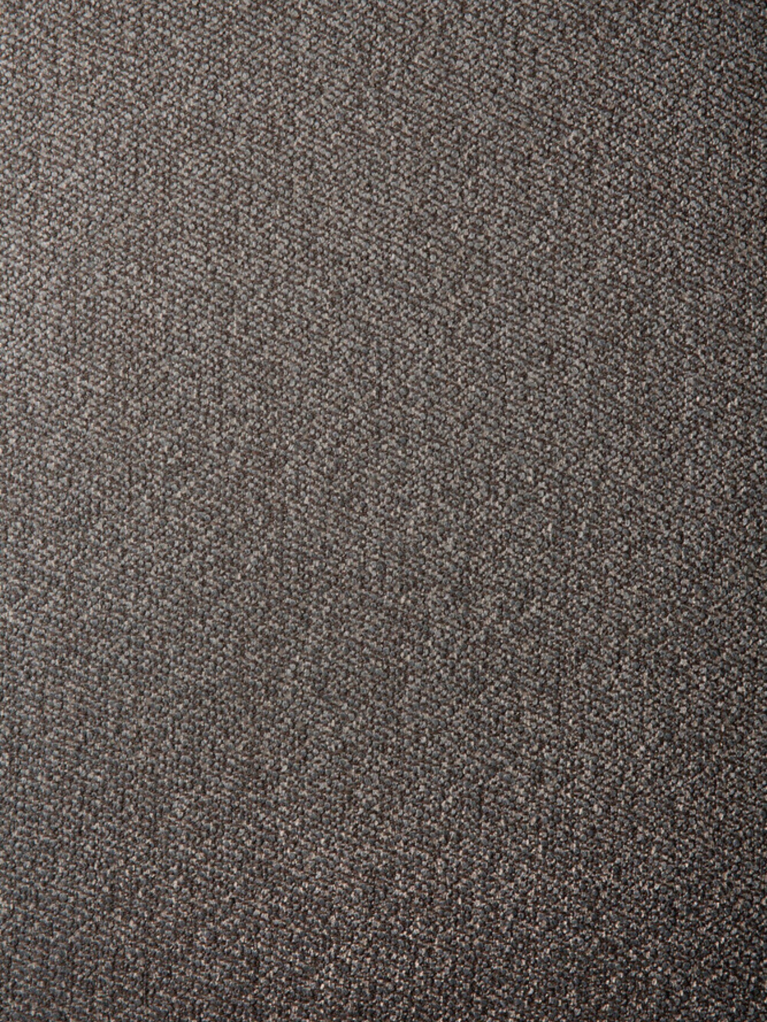 Ethnicraft Mellow Modular Sofa 90° Square Corner, close-up of the fabric texture. The premium dark gray, woven material shows a subtle, intricate pattern, highlighting its durable and luxurious feel.