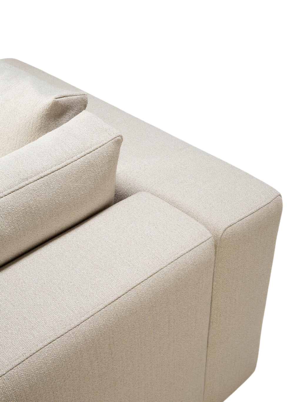 Ethnicraft Mellow Modular Sofa, a close-up detail of the square corner module's luxurious light beige textured fabric, highlighting the precise stitching and plush, inviting cushions, on white background.