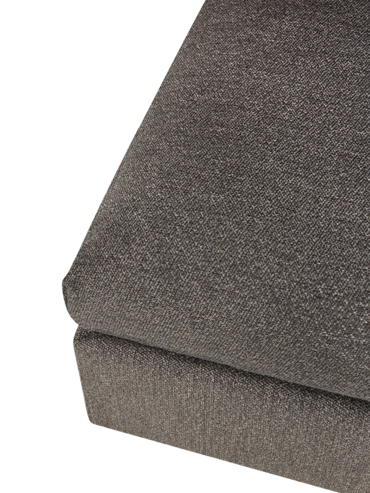 Ethnicraft Mellow Modular Sofa footstool detail, a close-up shot revealing the corner and side profile of the dark grey, tightly woven fabric, emphasizing its robust texture and precise stitching on a white background.
