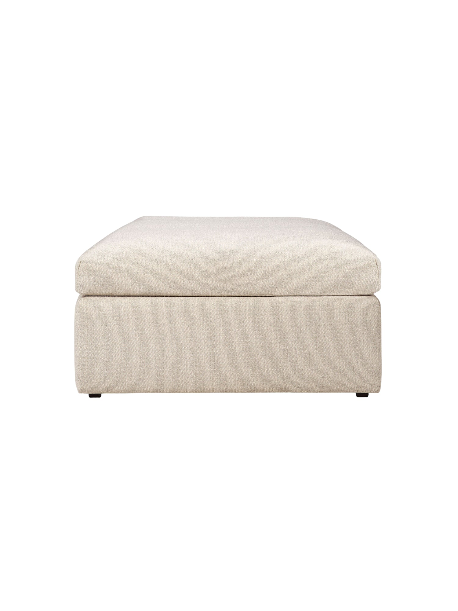 Ethnicraft Mellow Modular Sofa footstool, viewed from the front, showcasing its generous, comfortable design and premium cream-colored, textured fabric upholstery, displayed on a white background.