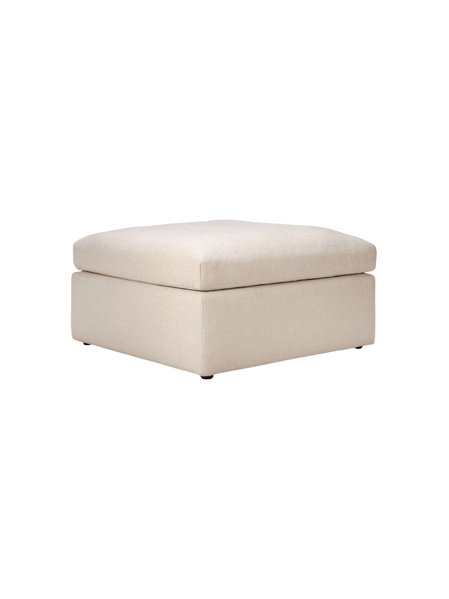 Ethnicraft Mellow Modular Sofa footstool, shown from the side, featuring its plush, square design and elegant cream-colored, textured fabric upholstery, presented on a clean white background.