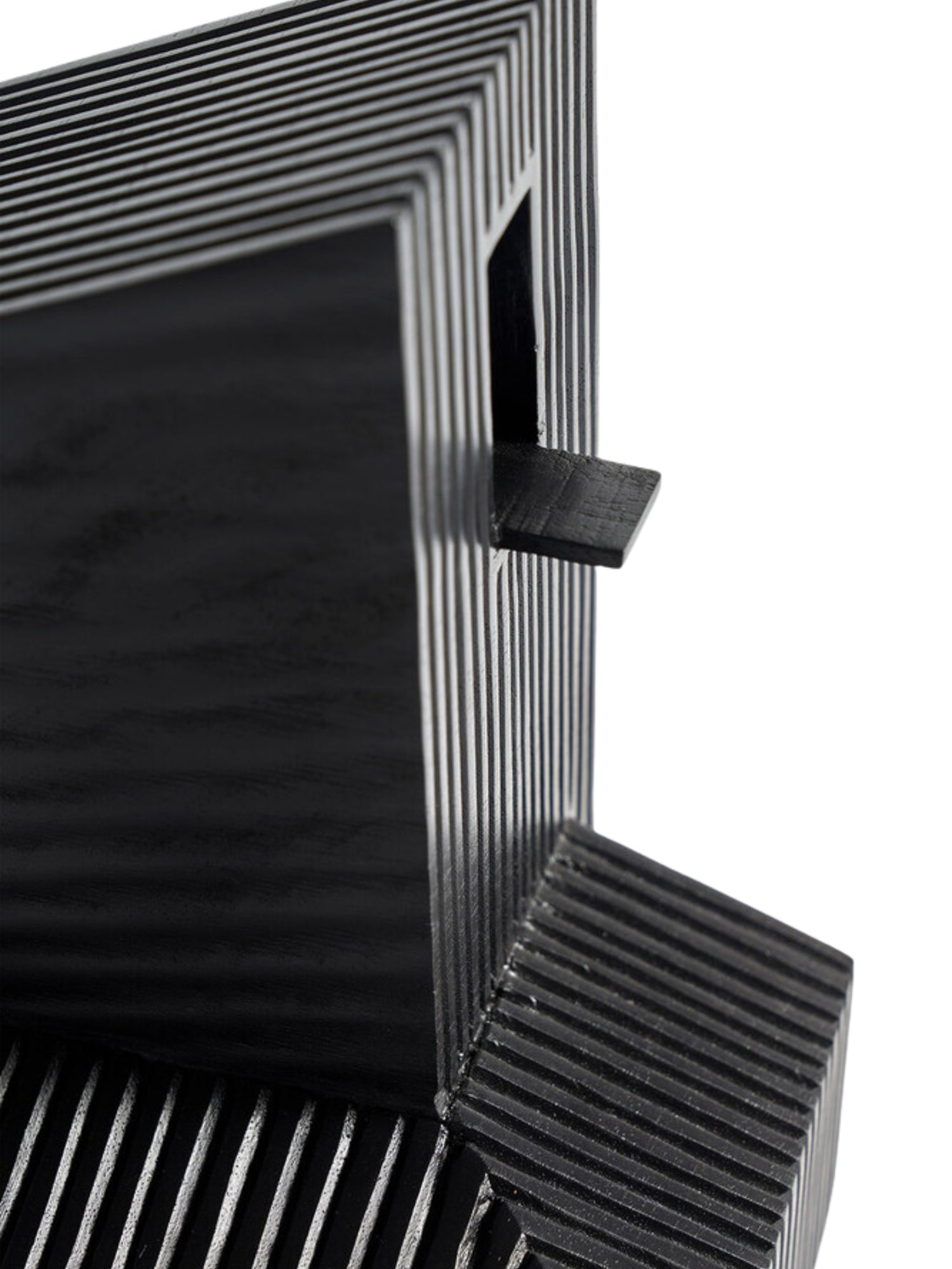 Ethnicraft Modern Farmhouse Object, a close-up detail of the black wooden sculpture, highlighting the precise, deep vertical grooves and a small rectangular cutout, showcasing its premium craftsmanship on a white background.
