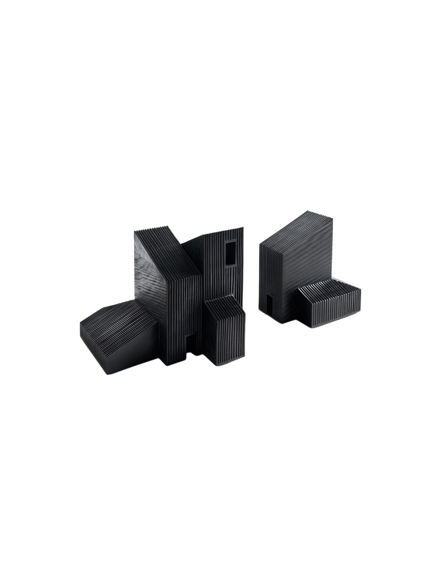 Ethnicraft Modern Farmhouse Object, a set of two abstract, black wooden sculptures with ribbed textures. These unique decorative pieces resemble architectural forms, displayed against a clean white background.