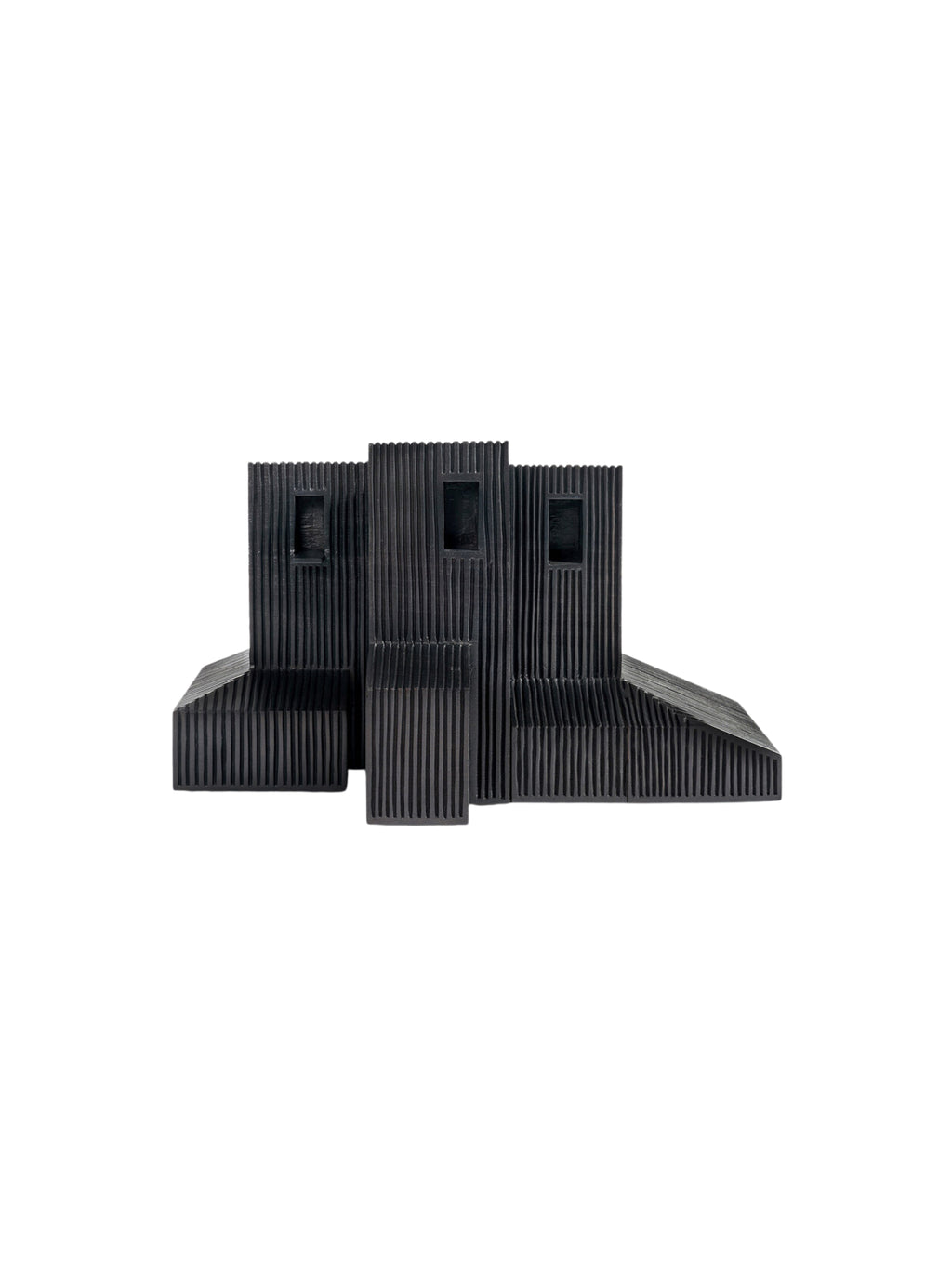 Ethnicraft Modern Farmhouse Object, a single black wooden sculpture with a distinctive ribbed texture, resembling a minimalist building. Its dark, rich color and geometric design are prominent, on a white background.