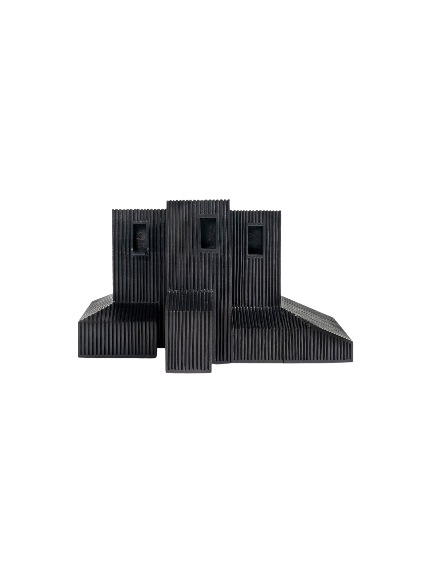 Ethnicraft Modern Farmhouse Object, a single black wooden sculpture with a distinctive ribbed texture, resembling a minimalist building. Its dark, rich color and geometric design are prominent, on a white background.