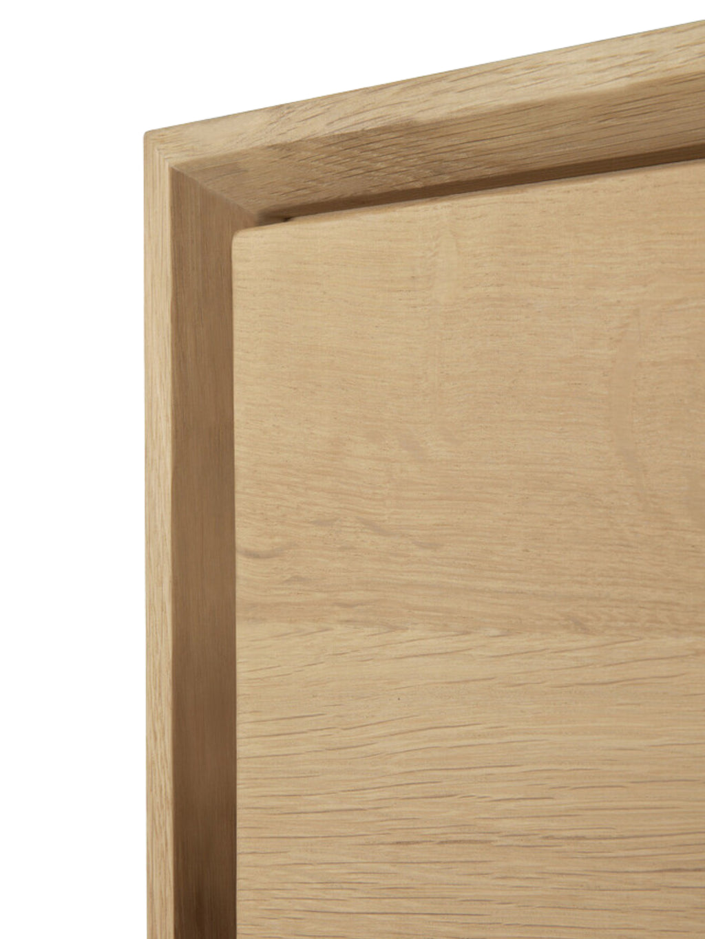 Ethnicraft Nordic Dresser, a close-up detail shot of the light oak wood grain and smooth, minimalist drawer edge, showcasing the premium craftsmanship on a white background.