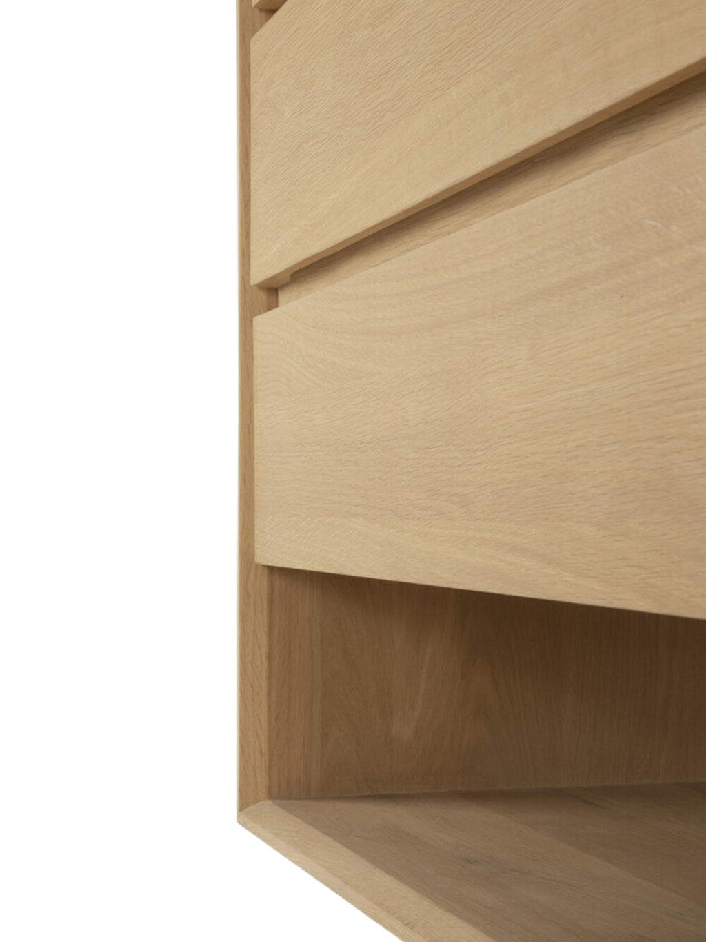 Ethnicraft Nordic Dresser, a detailed view of the bottom drawer and open shelf in light oak, highlighting the seamless construction and natural wood texture on a white background.