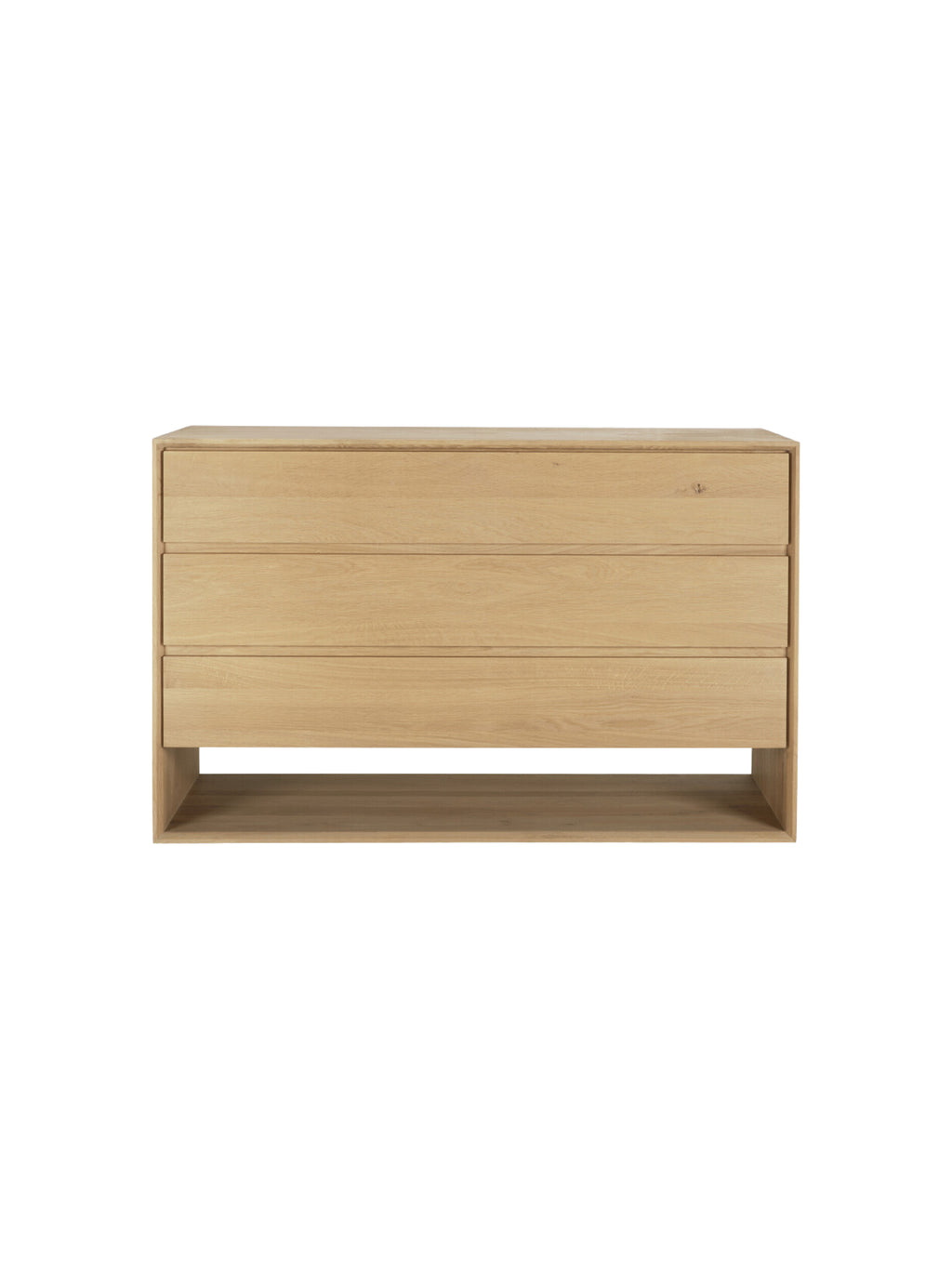 Ethnicraft Nordic Dresser, a sleek and modern light oak wood dresser featuring three flush drawers and a convenient open bottom shelf. The natural wood finish and simple, elegant design make it a versatile storage solution, displayed on a white background.