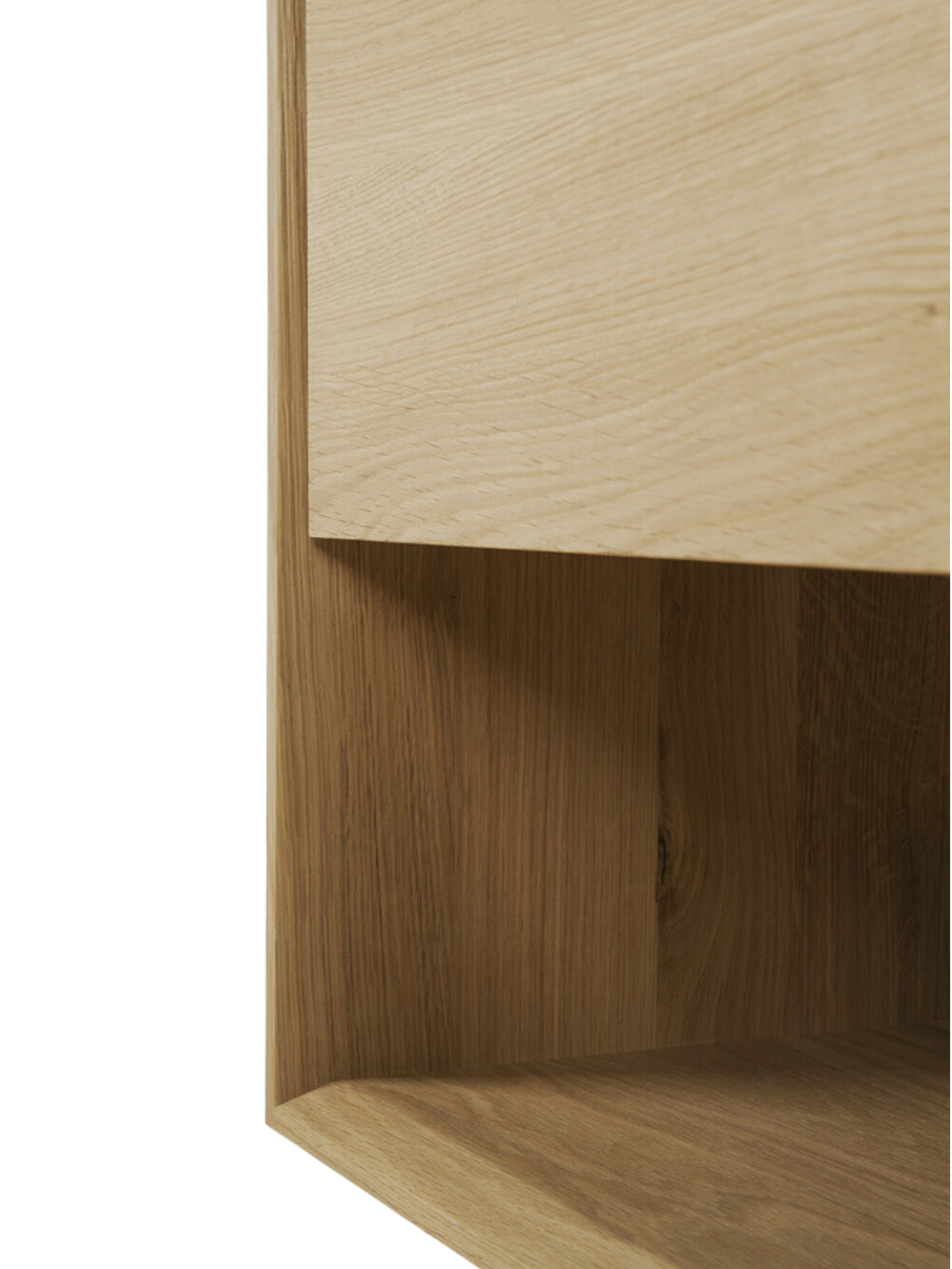 Ethnicraft Nordic Sideboard, a close-up detail shot showcasing the natural light oak wood grain and smooth finish of the modern, minimalist design, displayed on a clean white background.