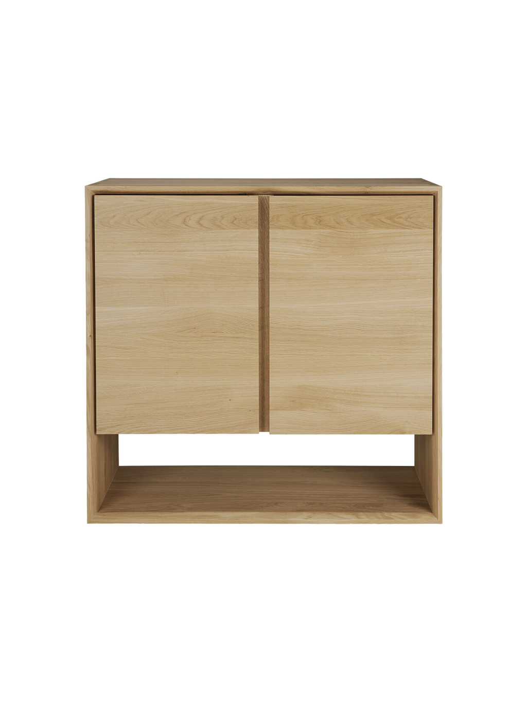 Ethnicraft Nordic Sideboard, a contemporary and functional design in light oak wood, featuring two sleek cabinet doors and a spacious open bottom shelf, presented on a white background.