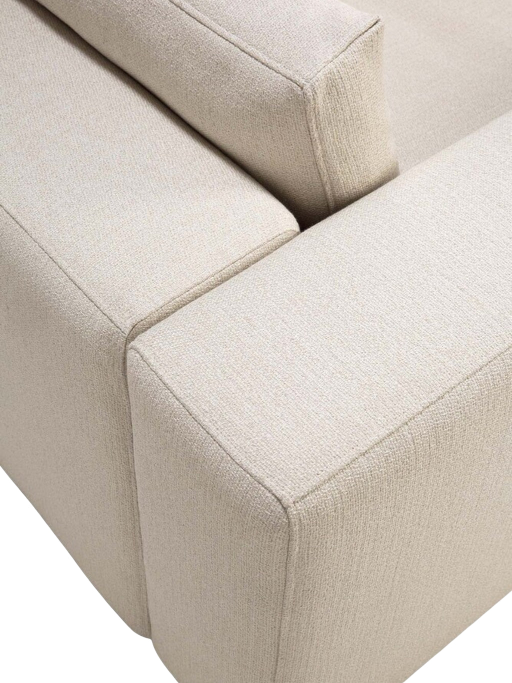Ethnicraft Mellow Modular Sofa detail, showing the clean lines and modular design of the light beige, textured fabric upholstery. The precise stitching and plush cushions highlight the sofa's modern elegance.