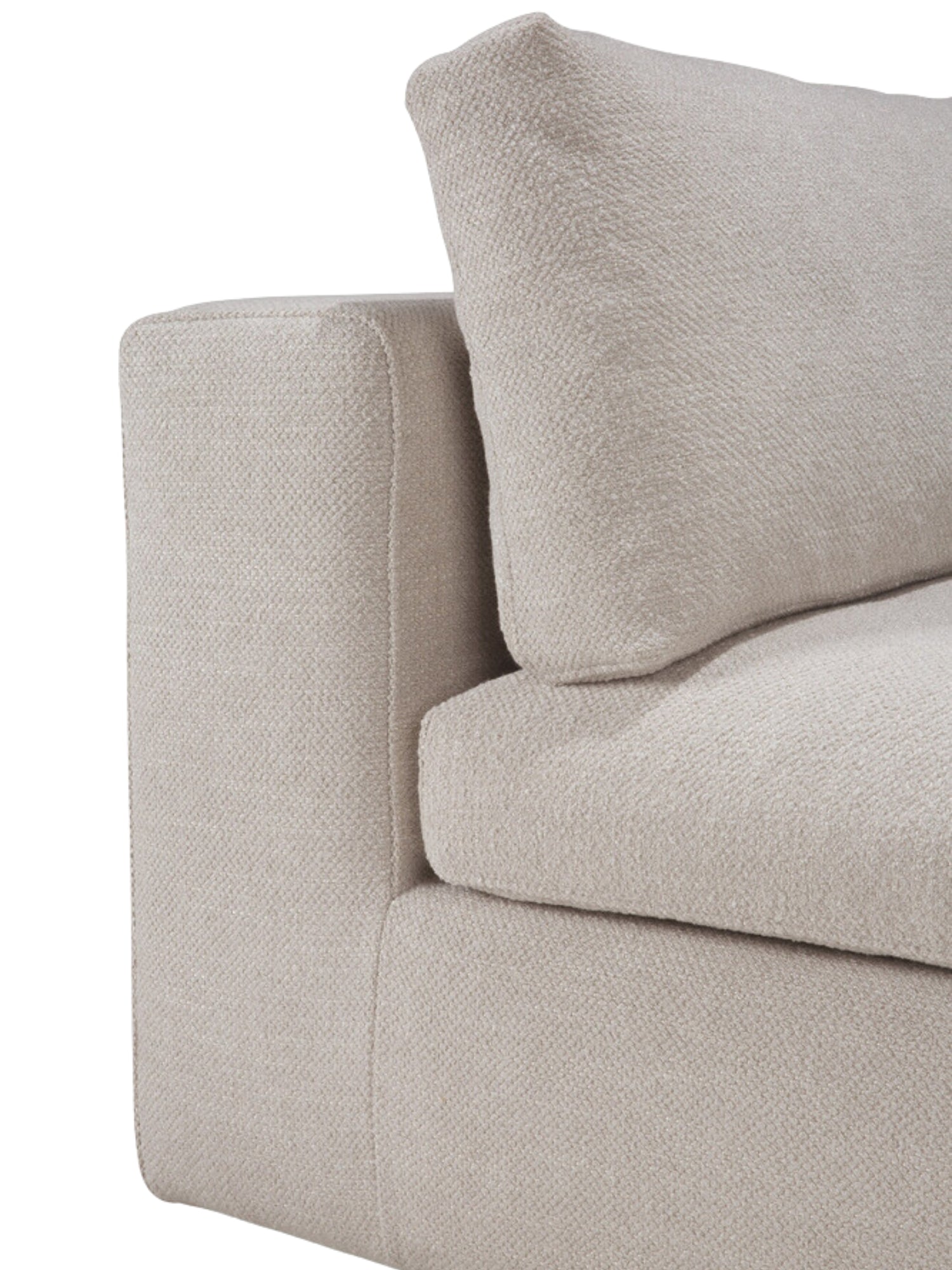 Ethnicraft Mellow Modular Sofa detail, showcasing the side profile of the armrest and a plush back cushion in a light beige, subtly textured fabric, emphasizing the comfortable and elegant design.