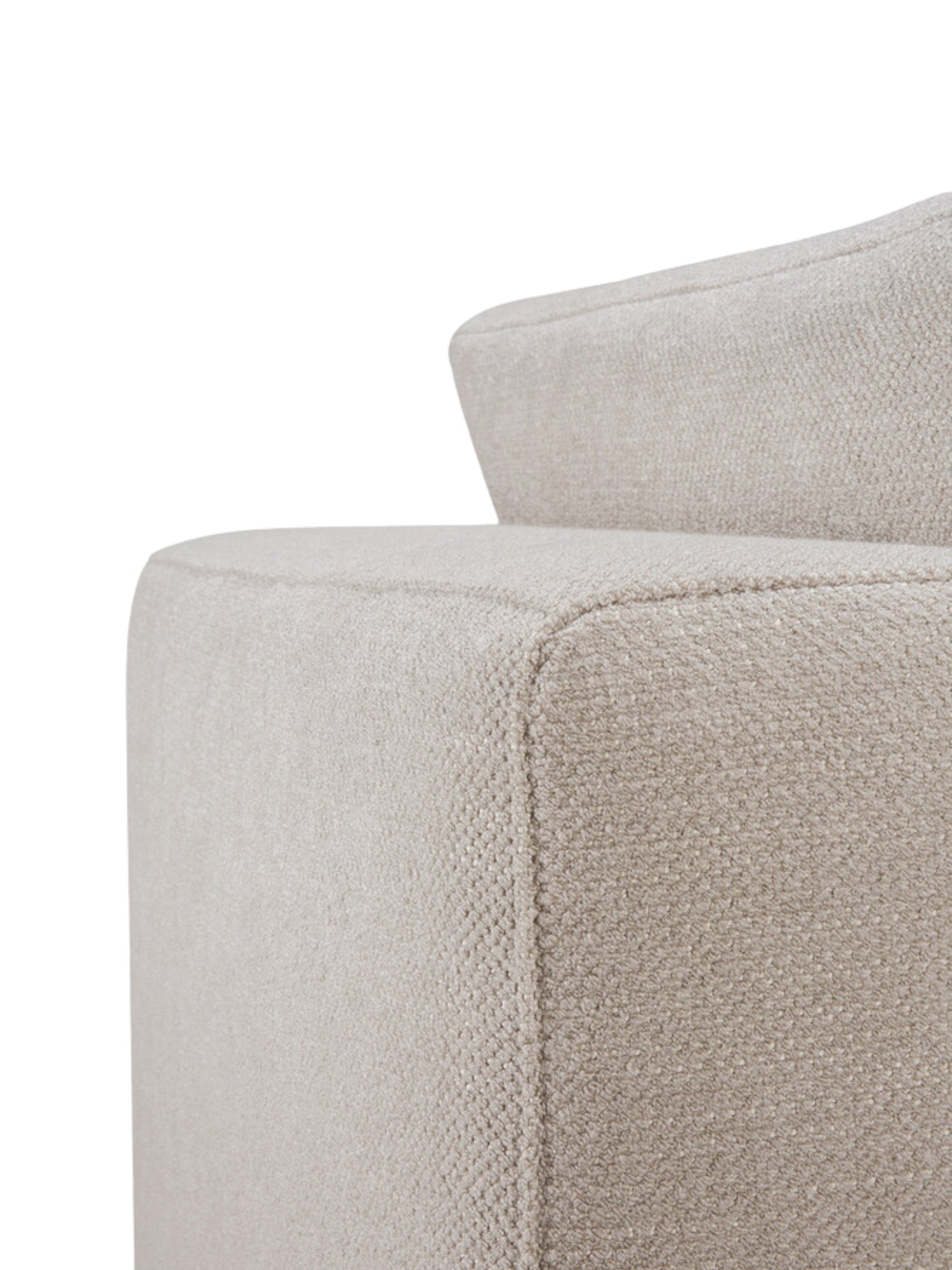 Ethnicraft Mellow Modular Sofa detail, a close-up of the armrest and back cushion in light beige textured fabric, highlighting the clean, contemporary lines and the soft, inviting texture of the upholstery.
