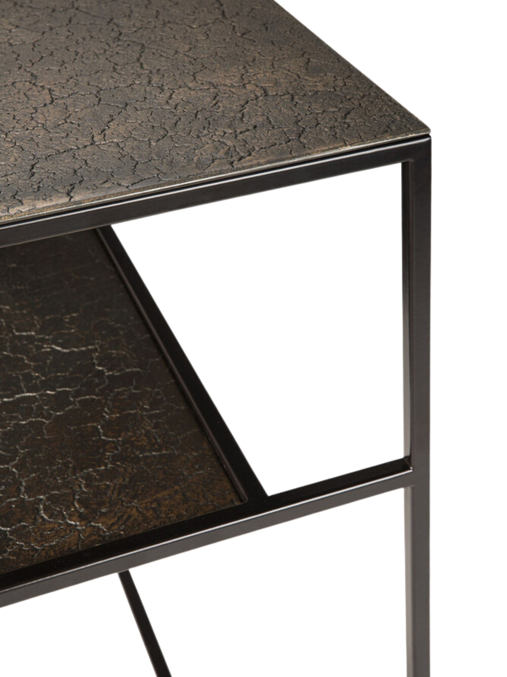 Ethnicraft Pentagon Console, a close-up detail showcasing the unique, rugged texture of the whisky-finished top and lower shelves, framed by the minimalist black metal structure, on white.