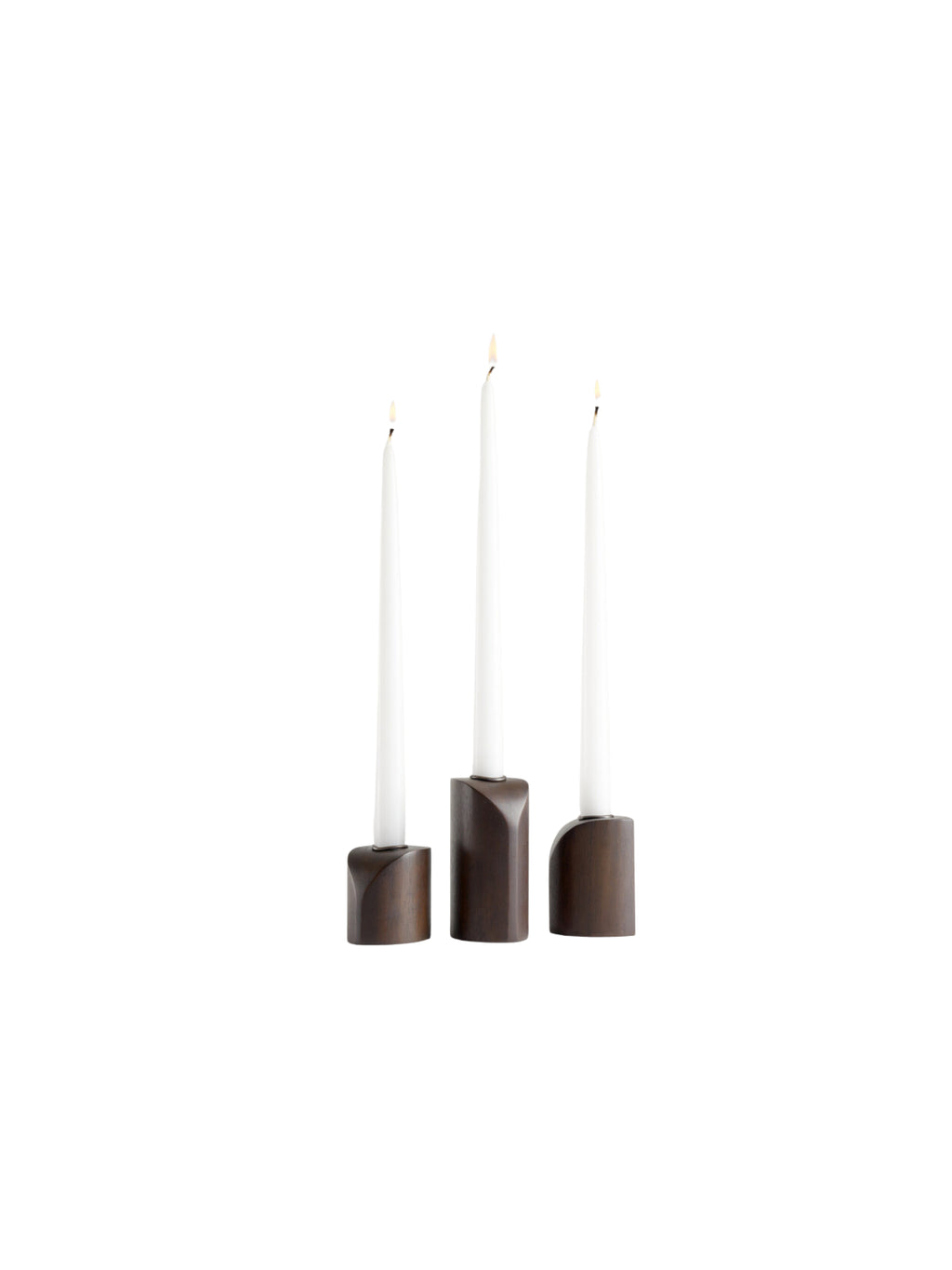 Ethnicraft PI Candle Holders - Set of 3, dark brown mahogany wood, front view, holding white taper candles, highlighting their minimalist and elegant design on a clean white background.