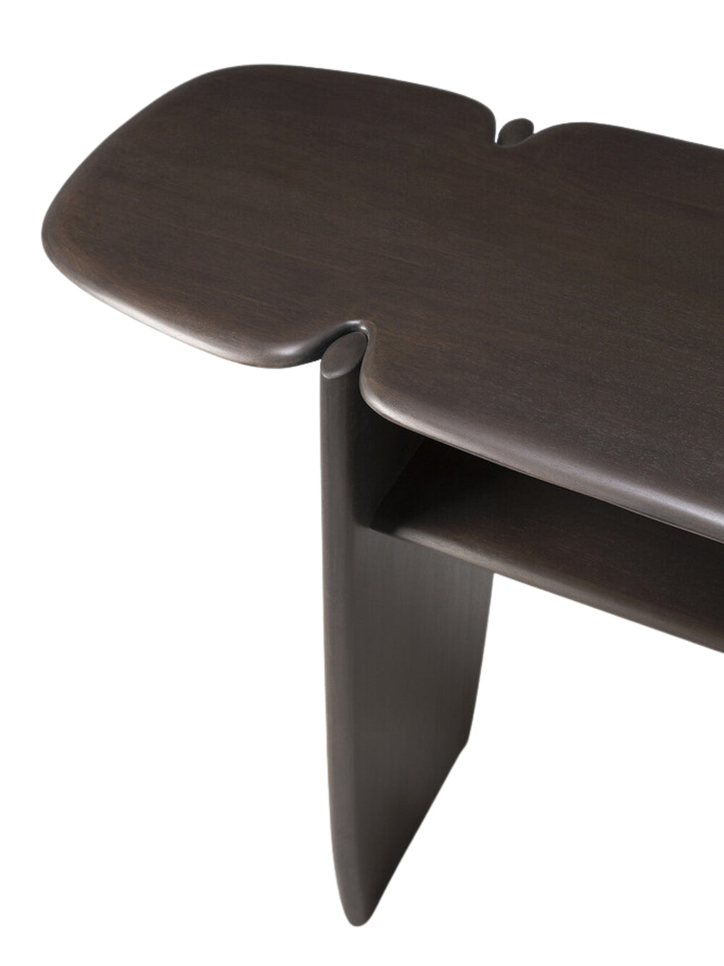 Ethnicraft PI Console, a close-up detail of the dark brown mahogany wood, showcasing the smooth, curved edges and the seamless integration of the top and lower shelves, on a white background.