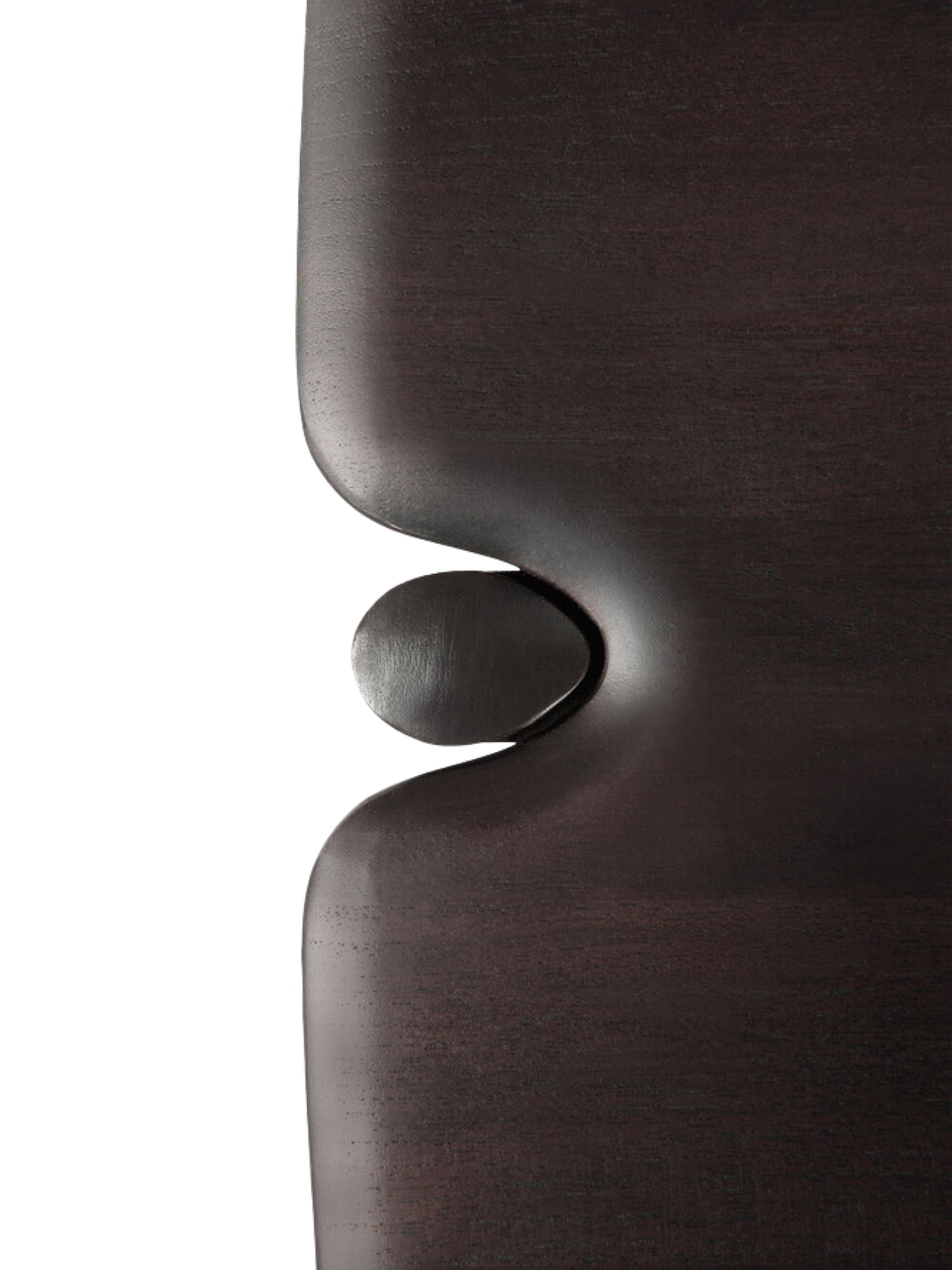 Ethnicraft PI Console in dark brown teak, a detailed close-up of the table's edge, showcasing the elegant, rounded design and the seamless integration of the leg into the tabletop, with a rich, dark wood texture.