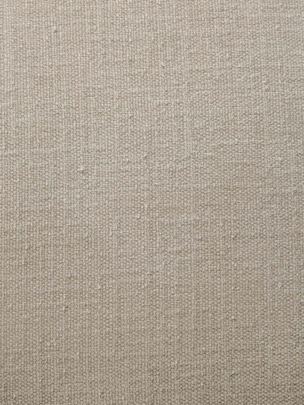 Ethnicraft Roller Max Pouf's light beige fabric. A detailed close-up of the premium, tightly woven textile, revealing its subtle texture and natural, earthy tone, perfect for modern interiors.