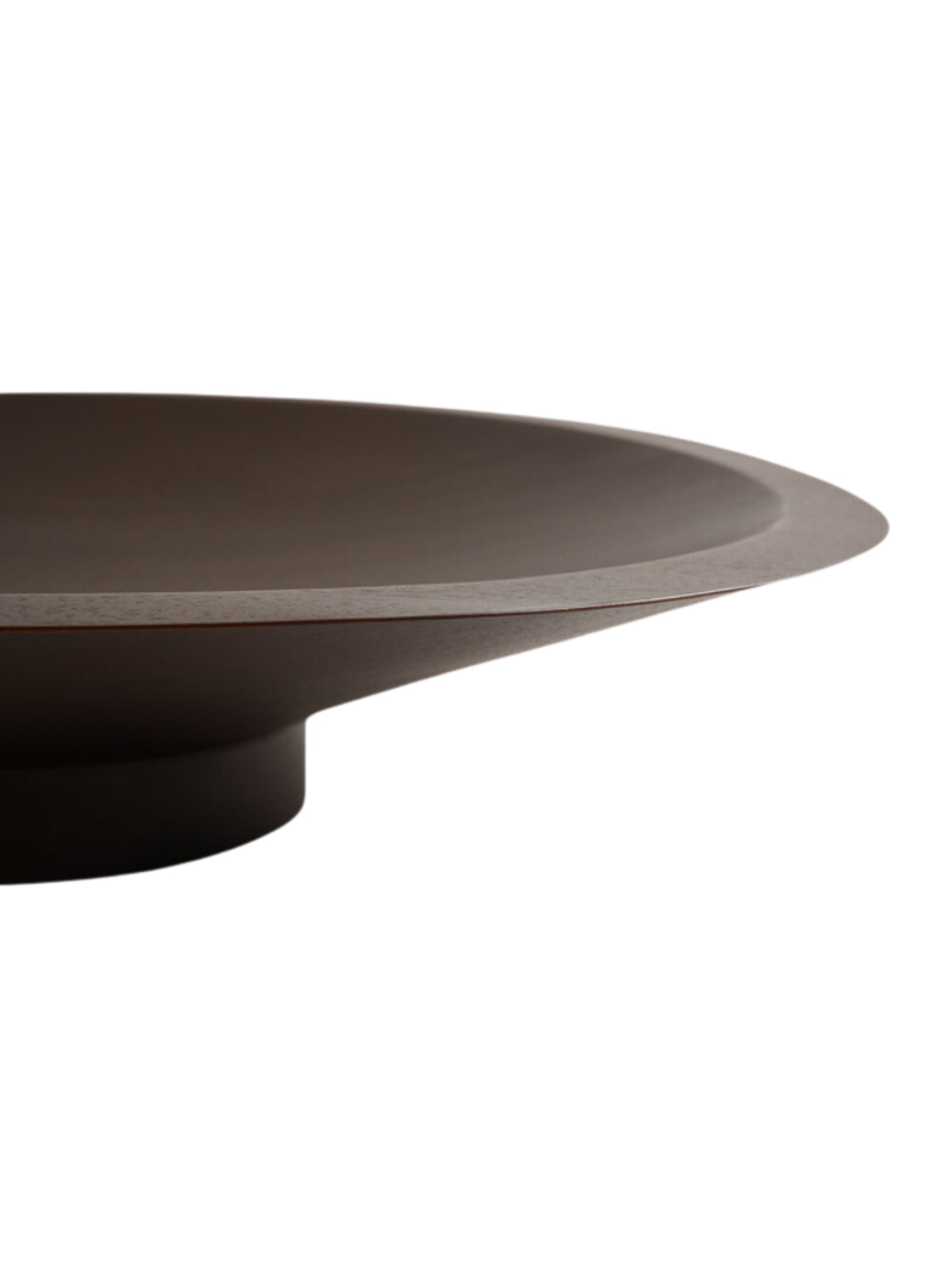 Ethnicraft Satellite Bowl in Mahogany Dark Brown, a close-up detail of the elegant, smooth rim and subtle curve of the rich dark brown wooden bowl, displayed on a pristine white background, highlighting its refined design.