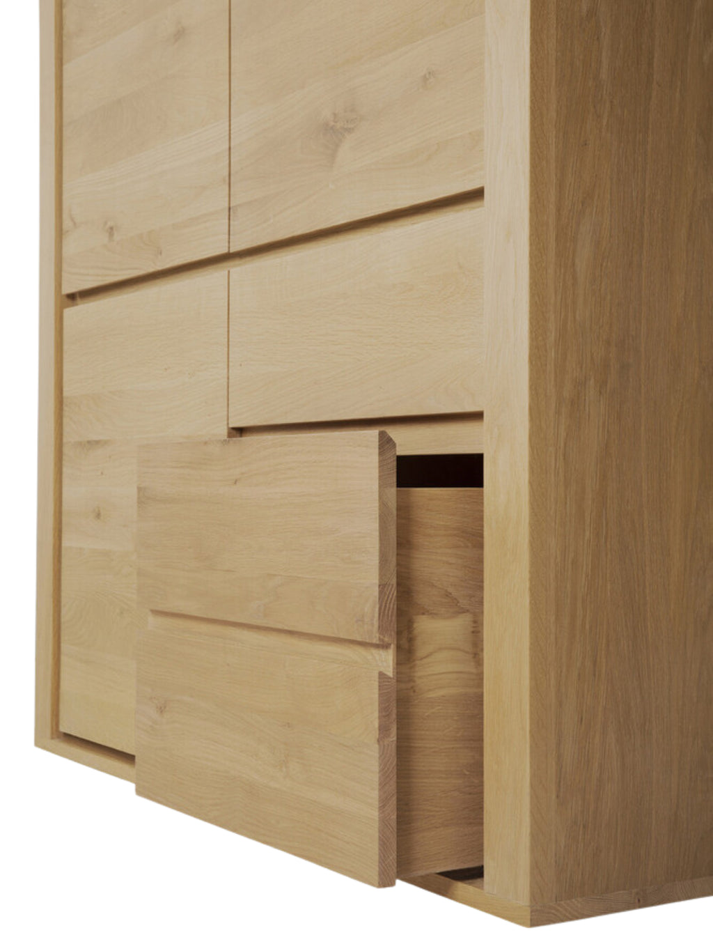 Ethnicraft Shadow Dresser, made from premium light oak wood, with one drawer partially open, revealing the smooth interior. The modern, clean lines emphasize the natural wood texture, presented on a bright white background.