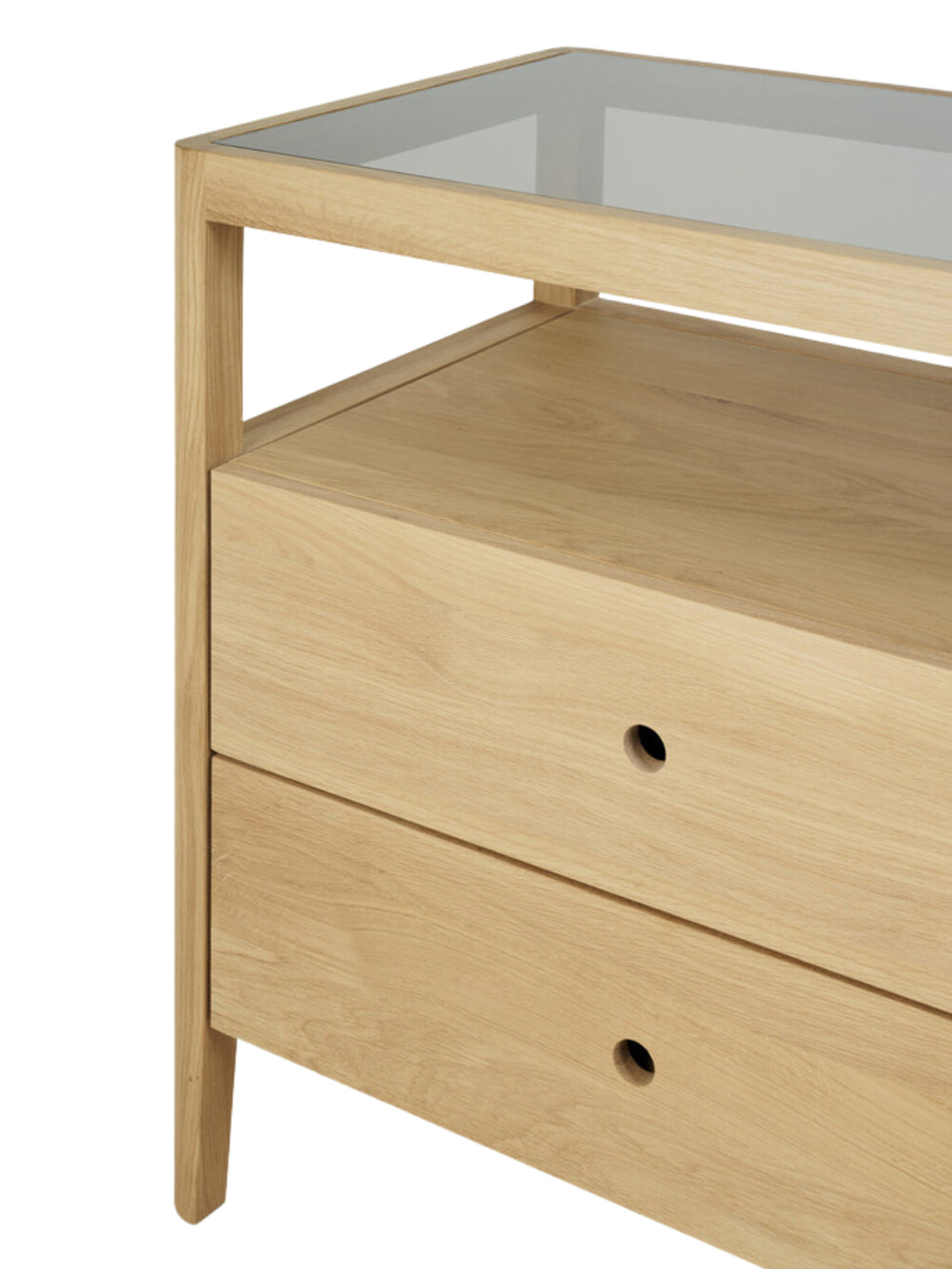 Ethnicraft Spindle Dresser in natural oak, a close-up of the two bottom drawers with subtle round pulls and the sleek glass top, highlighting the modern design.
