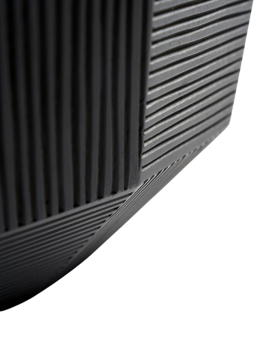Ethnicraft Striped Bowl, a close-up detail shot revealing the exquisite craftsmanship of the black wooden bowl, highlighting its precise geometric striped patterns and textured surface.