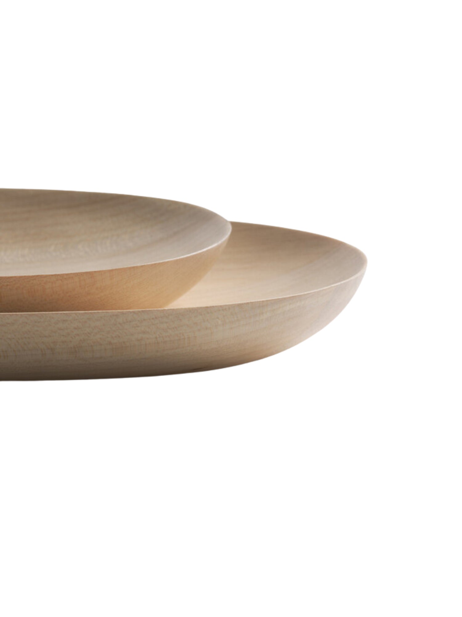 Ethnicraft Thin Oval Boards Set, a close-up detail shot revealing the smooth, light sycamore wood grain and the gently curved edges of the two oval boards. The natural, minimalist design highlights the premium craftsmanship, set against a white background.