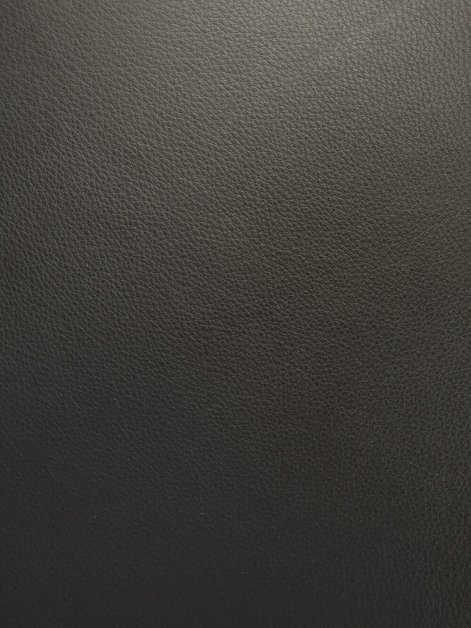Ethnicraft Jack Bench with mahogany dark brown frame and black leather upholstery, showcasing the rich, textured grain of the premium leather material.