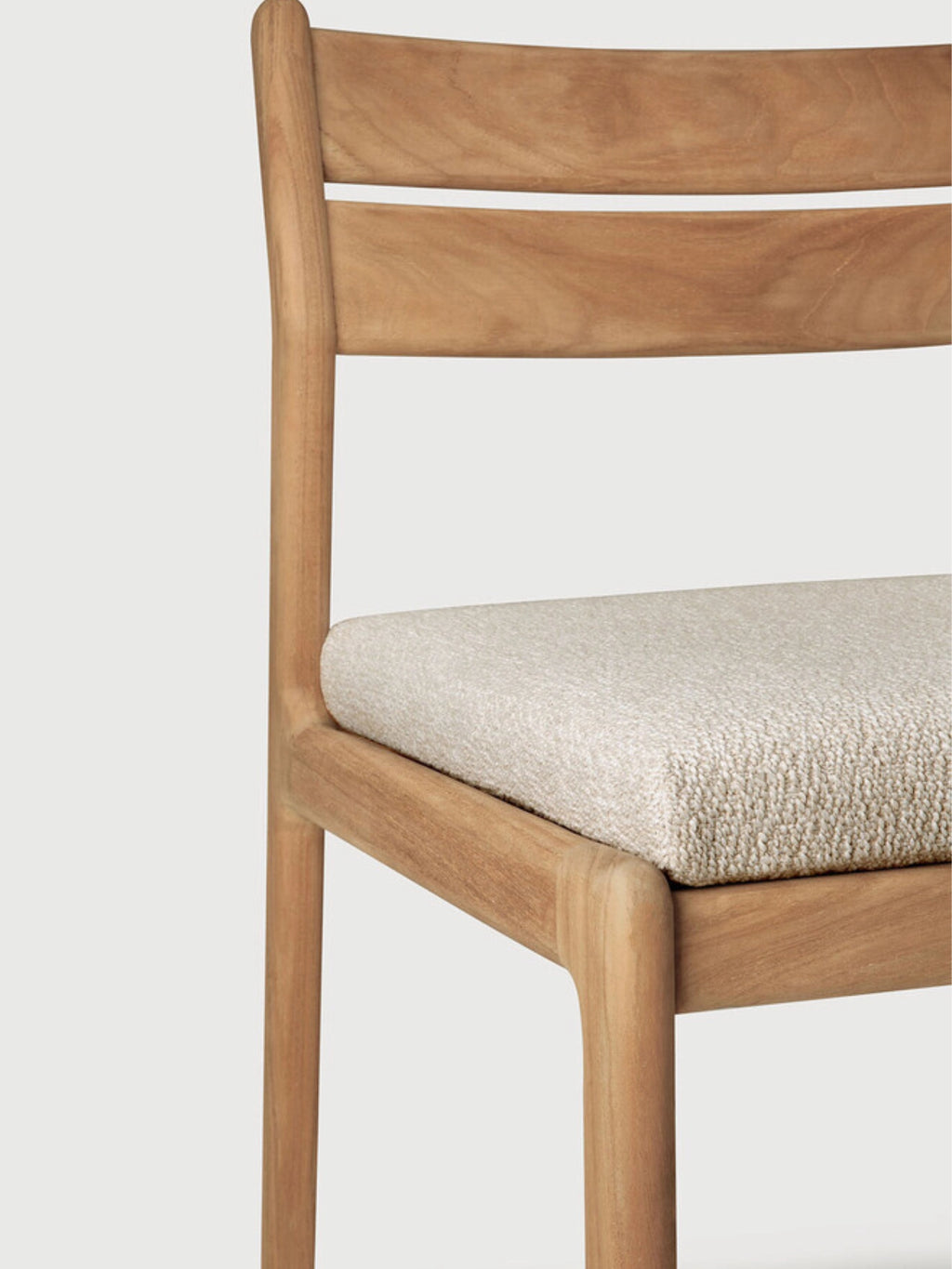 Ethnicraft Jack Outdoor Dining Chair Without Armrest, a modern minimalist dining chair crafted from durable solid teak wood with a warm natural honey tone, featuring a clean-lined frame and a subtly curved slatted backrest.