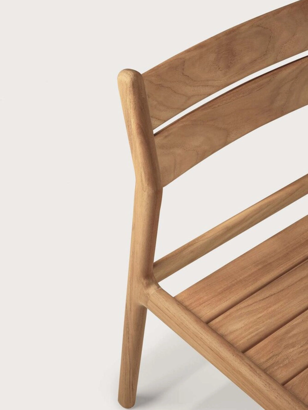 Ethnicraft Jack Outdoor Dining Chair Without Armrest, a modern minimalist outdoor dining chair crafted from warm natural solid teak wood, featuring a gently curved slatted backrest and seat with smooth, rounded edges. This durable wooden patio chair is perfect for contemporary outdoor dining spaces, garden seating, or a Scandinavian-inspired balcony.