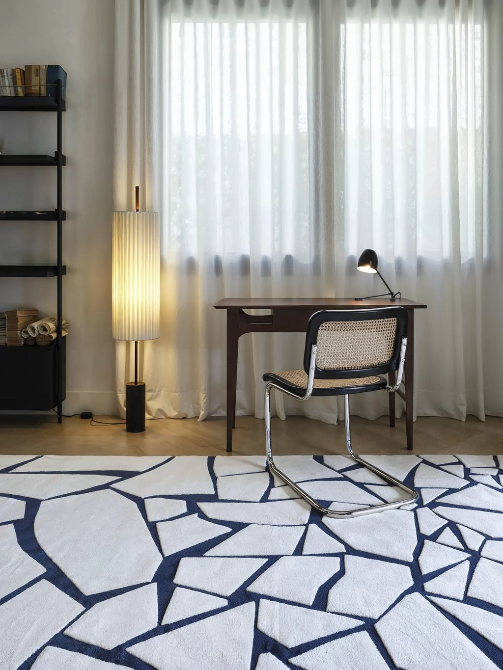 alp_ Arctic Rug, a stunning hand-tufted wool area rug featuring a bold abstract geometric pattern of raised white, plush cut-pile shapes against a contrasting deep navy blue background, creating a cracked ice or broken tile effect. This contemporary white and blue rug is ideal for adding a modern statement to living rooms, bedrooms, or creative home office spaces.