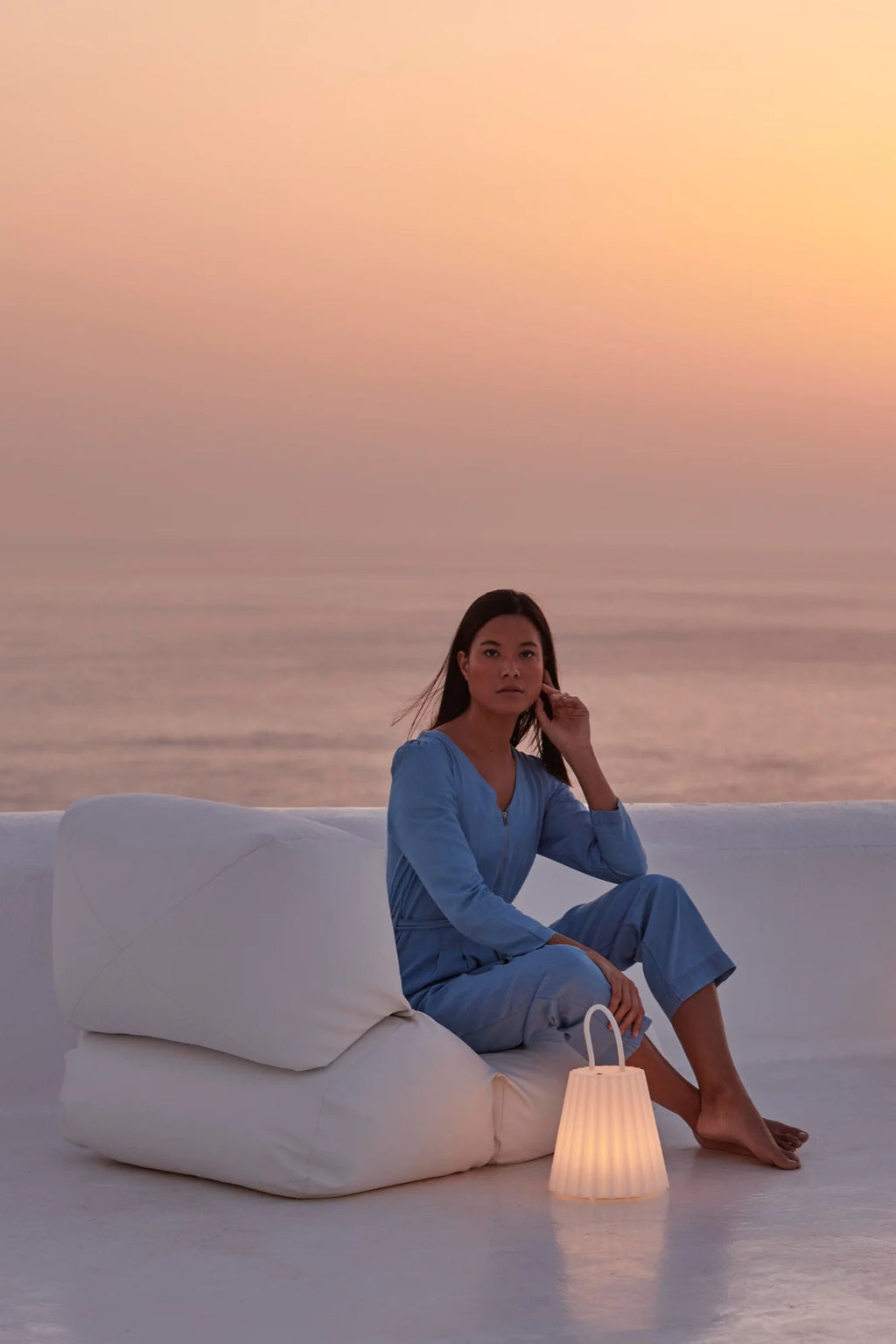 Gandia Blasco Grapy Outdoor Lounge Chair, a pristine white outdoor beanbag chair with a plush, organic modern design, featuring two soft, stacked cushions upholstered in durable, weather-resistant fabric. This contemporary outdoor seating is ideal for creating luxurious, minimalist lounging areas on patios, terraces, or poolside decks.