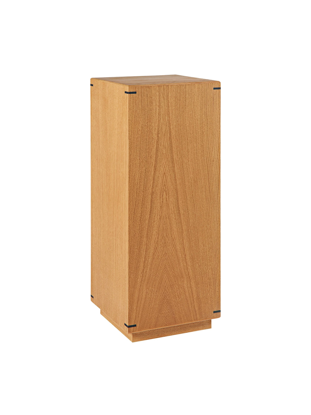 Kristina Dam Japanese Pedestal, a minimalist display stand crafted from light natural solid oak wood with distinctive dark black corner details and a clean, rectangular column silhouette. This elegant oak wood plinth offers a versatile surface for showcasing art, plants, or decorative objects. Ideal for modern minimalist, japandi, or Scandinavian living rooms and entryways.