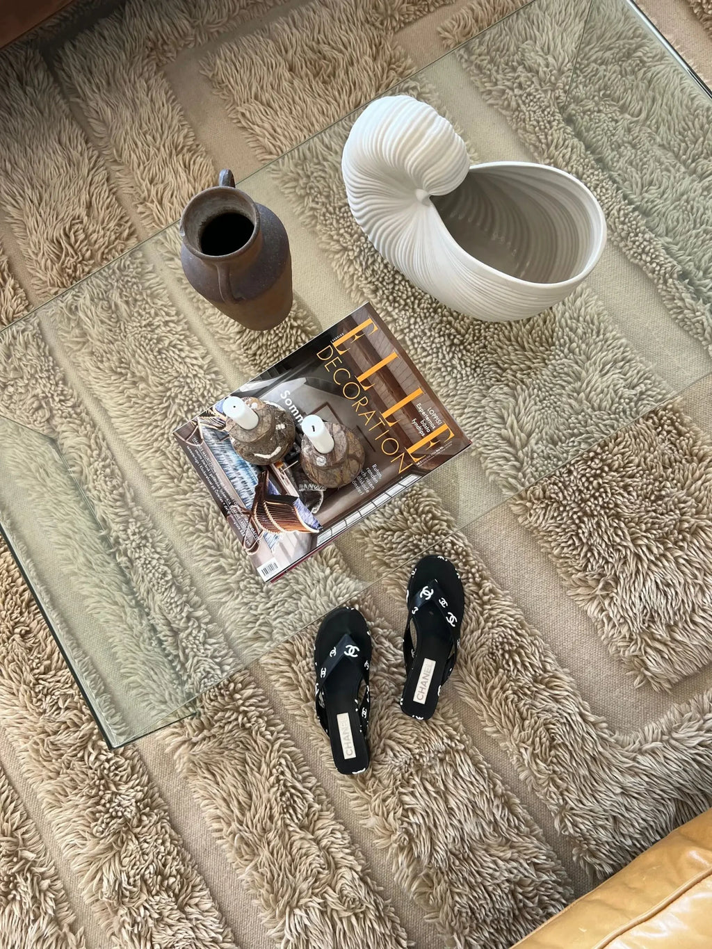 Tinted Objects Kask Wool Rug, a premium hand-loomed natural wool area rug showcasing a distinctive high-pile shaggy texture with alternating flat woven stripes in warm, undyed beige and oatmeal tones.