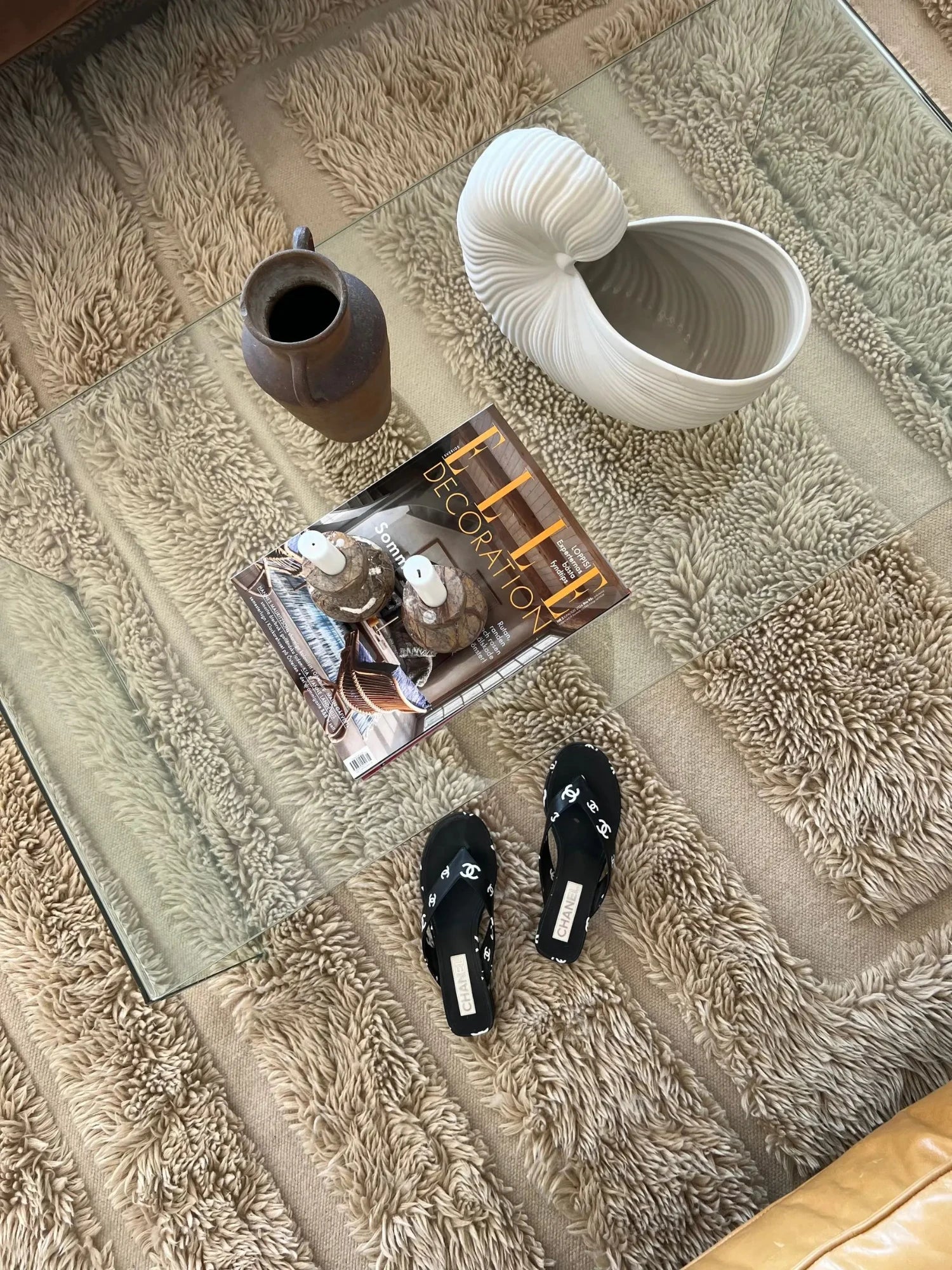 Tinted Objects Kask Wool Rug, a premium hand-loomed natural wool area rug showcasing a distinctive high-pile shaggy texture with alternating flat woven stripes in warm, undyed beige and oatmeal tones.