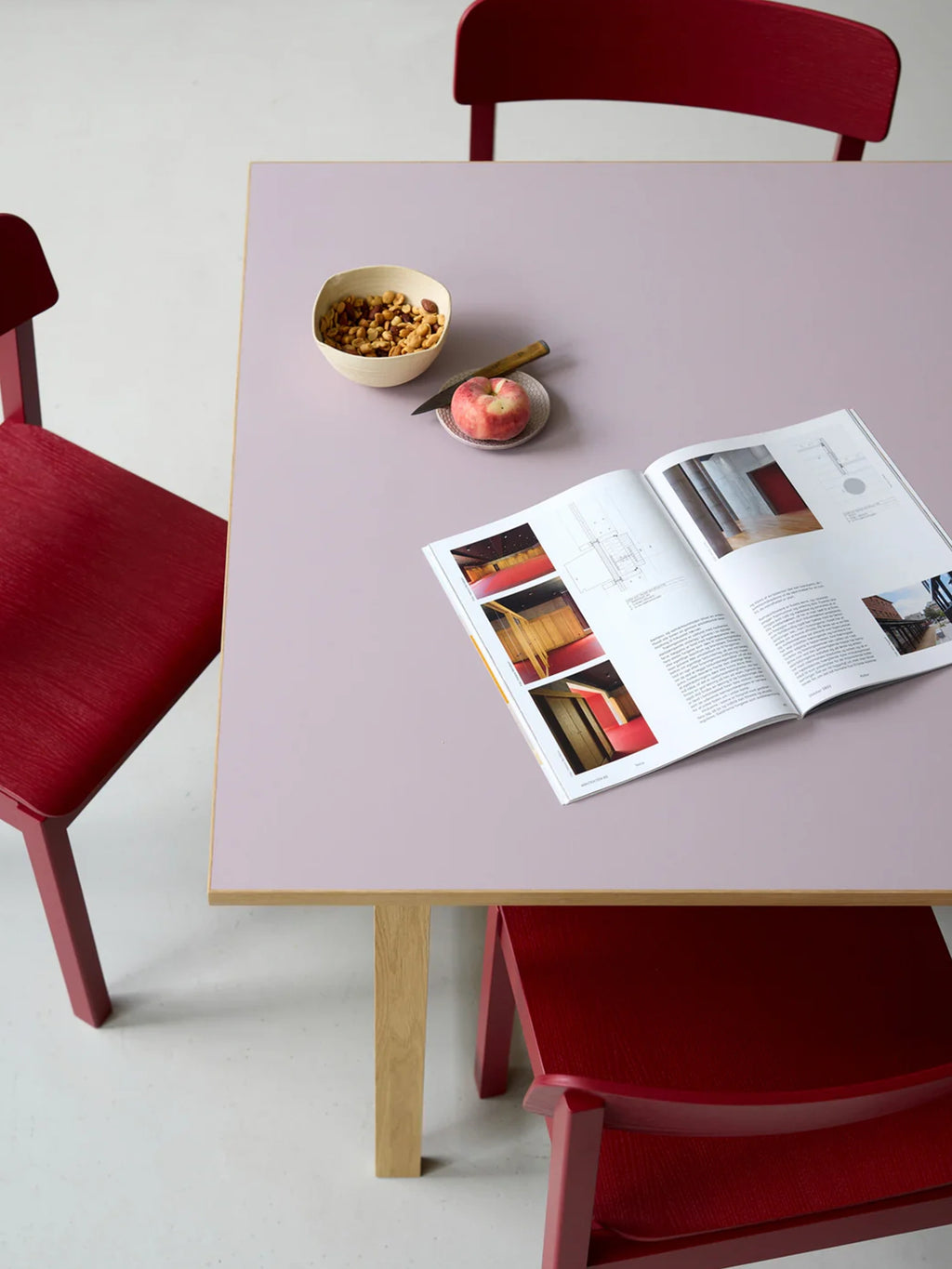 MOEBE Rectangular Dining Table, a modern minimalist dining table featuring a smooth lilac laminate tabletop with natural light oak wood edges and sturdy solid oak legs.
