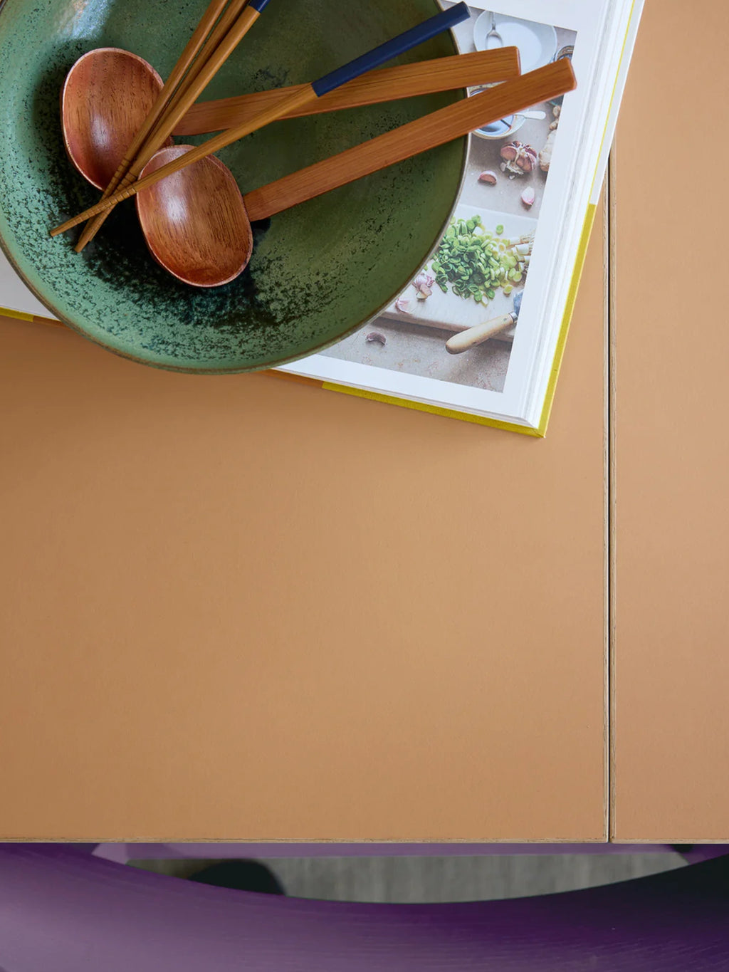 MOEBE Rectangular Dining Table, a modern minimalist dining table featuring a warm tan matte surface with a distinctive natural plywood edge, showcasing clean Scandinavian lines and a contemporary aesthetic. This versatile piece is ideal for stylish dining rooms or a modern kitchen space.