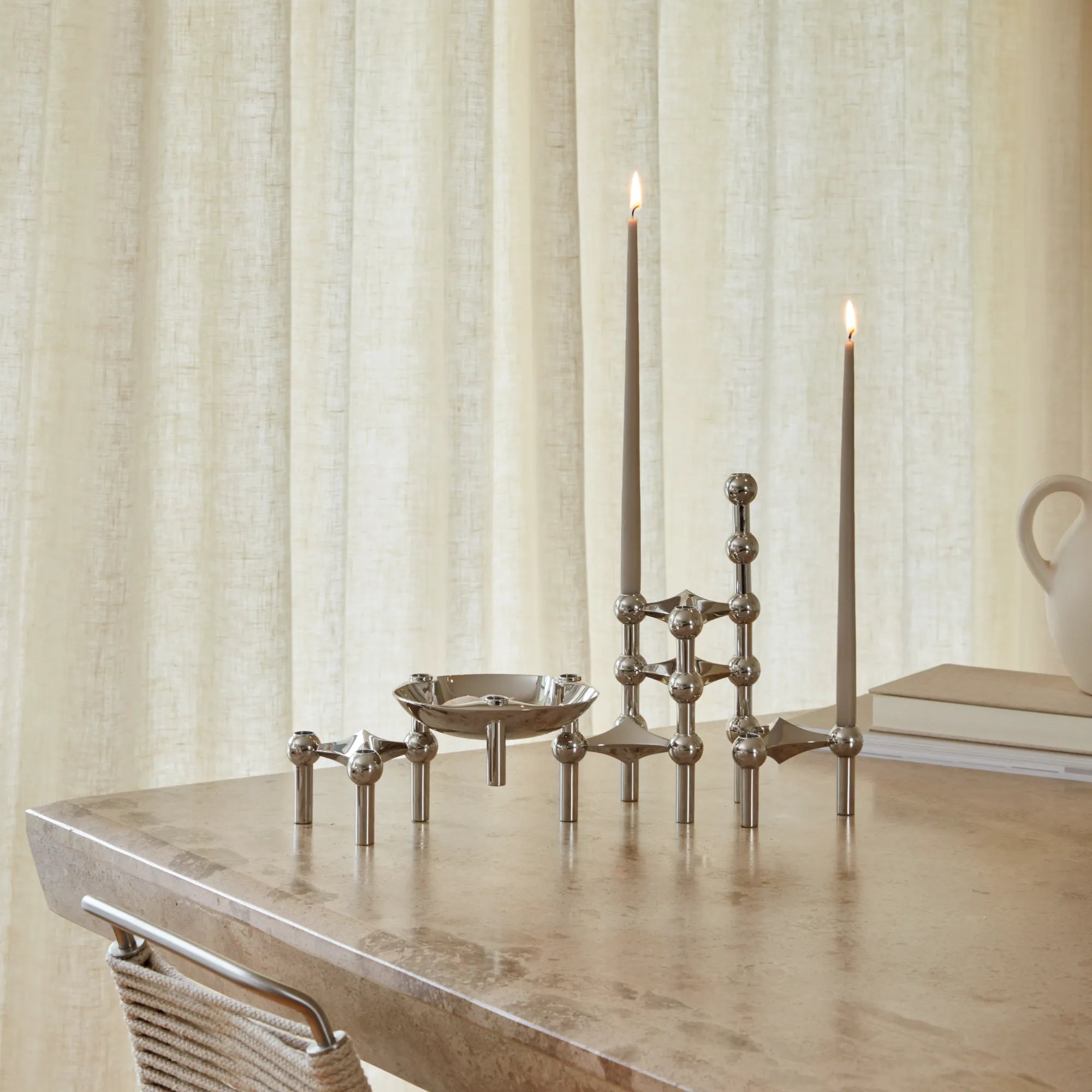 Stylish and modern chrome modular candle holder in Configuration 1