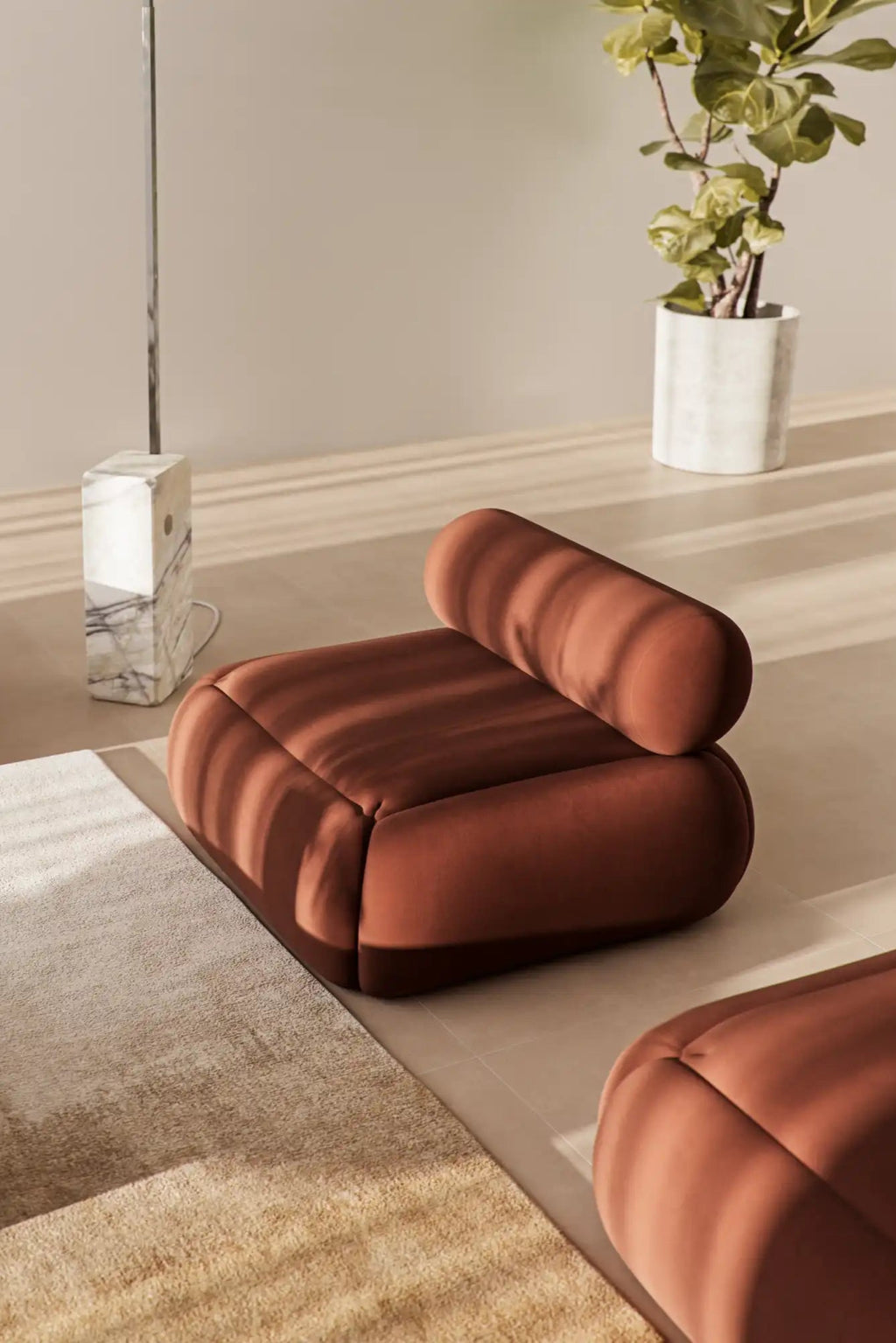  Lupin Sofa featuring a contemporary design with curved armrests and plush cushions