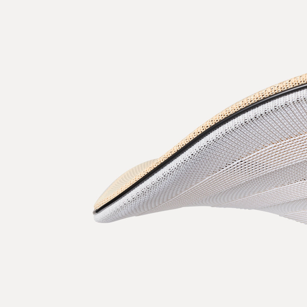Made by Hand Flying Ø58 Pendant Lamp, a contemporary organic modern ceiling lamp featuring a finely knitted white textile shade with an intricate, layered texture and a contrasting natural beige woven trim. This minimalist design incorporates a subtle black accent ring, creating a sophisticated floating aesthetic. Ideal as a statement lighting fixture for modern living rooms, Scandinavian dining areas, or zen-inspired bedrooms.