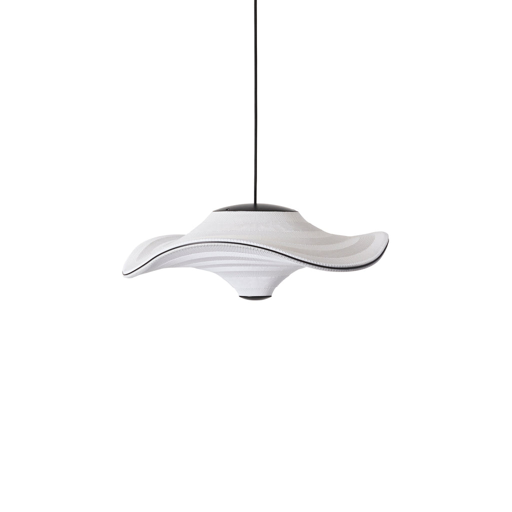 Made by Hand Flying Ø58 Pendant Lamp, a striking organic modern pendant light featuring a wide, undulating shade crafted from finely woven white textile, accented with sleek matte black metal details at the canopy and base. This sculptural ceiling lamp offers soft, diffused illumination, perfect for contemporary living rooms, minimalist dining areas, or as a statement piece in a modern bedroom.