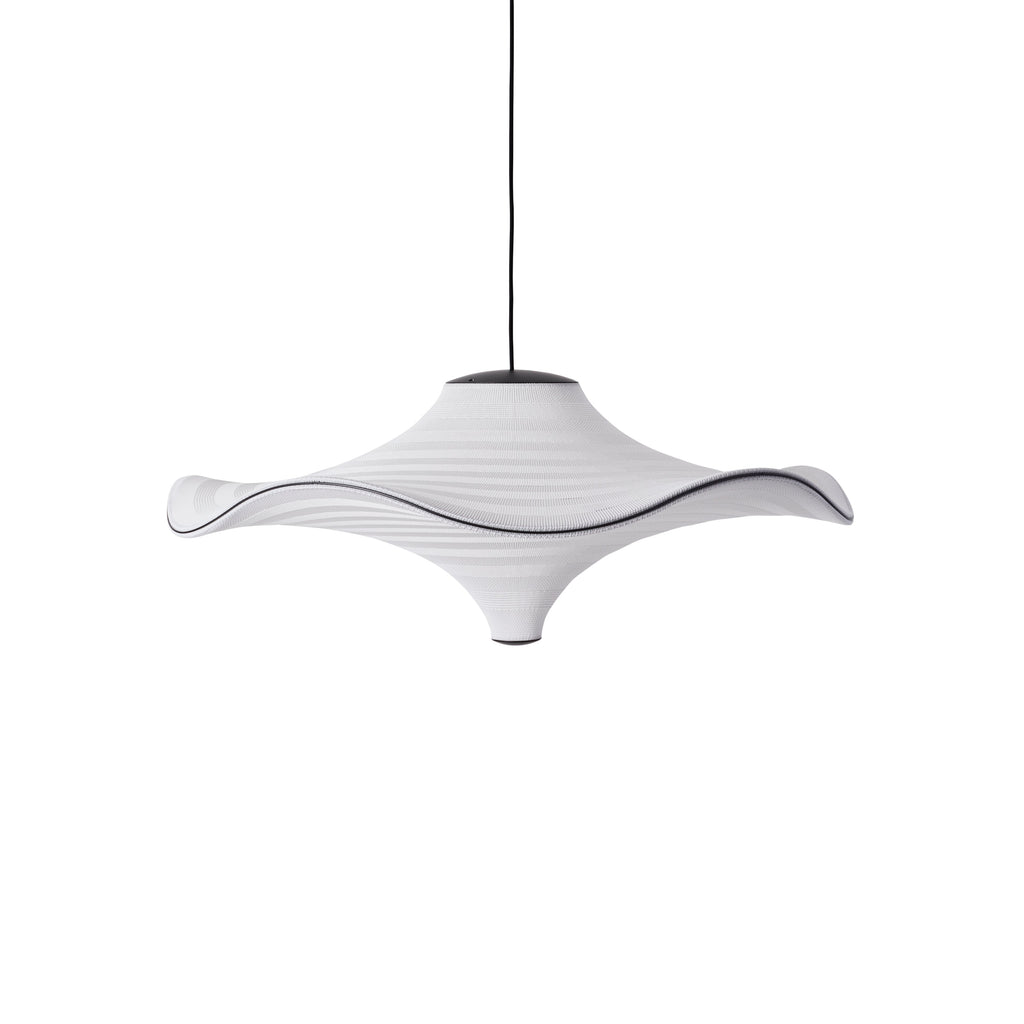 Made by Hand Flying Ø96 Pendant Lamp, a striking organic modern ceiling light featuring a sculptural, wavy white woven textile shade with subtle horizontal ribbing and a contrasting black trim. This contemporary suspension lamp showcases a unique undulating profile, suspended by a sleek black cord and matte black metal caps. Perfect as a statement piece for minimalist living rooms, modern dining areas, or design-forward entryways.