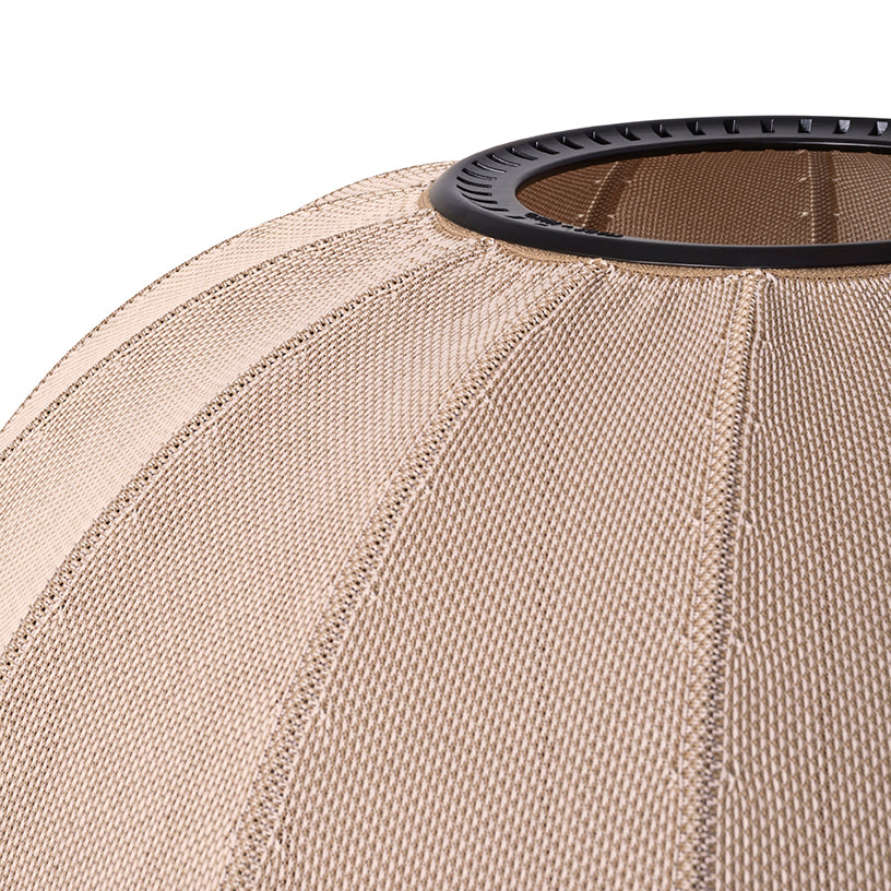 Made by Hand Knit-Wit Ø76 Oval Wall Light, a modern Scandinavian wall light crafted from a textured beige knitted fabric with distinctive vertical ribbed detailing and a sleek black metal top ring.