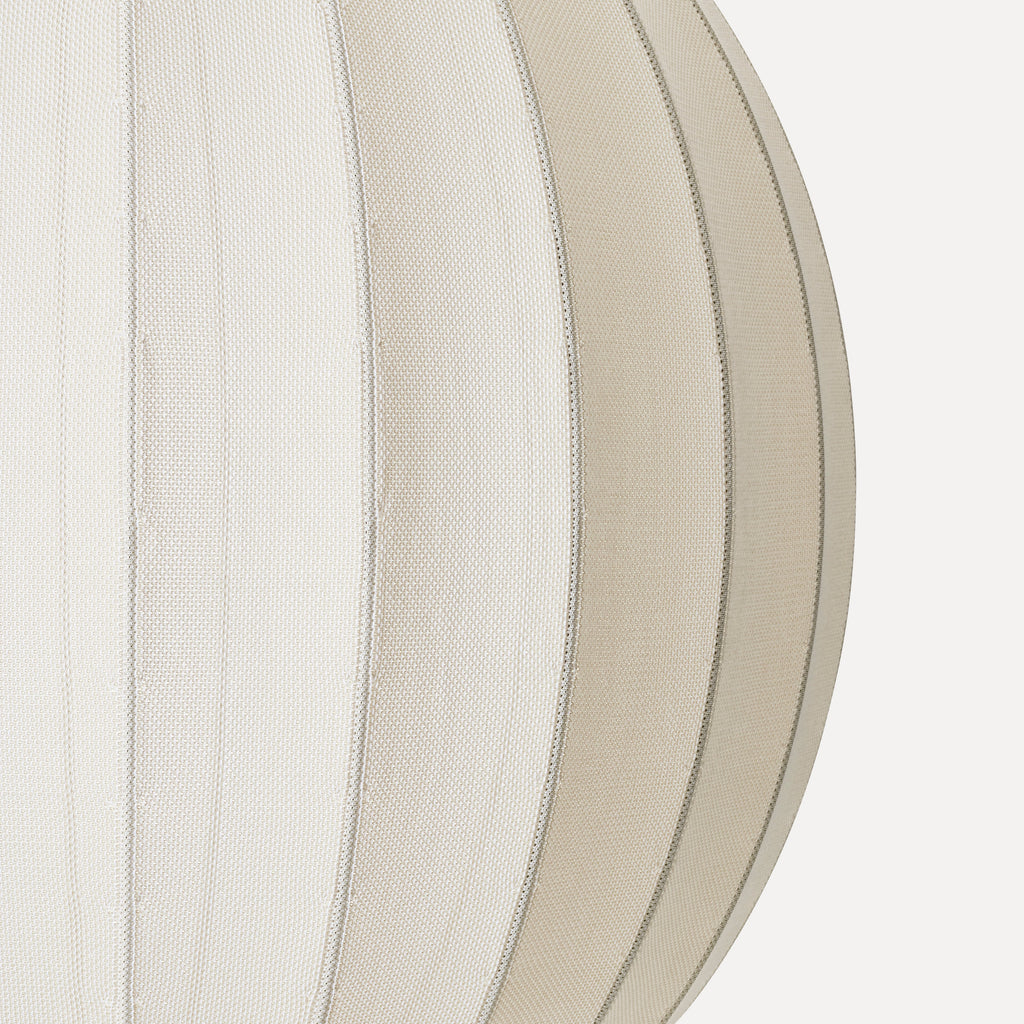 Made by Hand Knit-Wit Ø45 Oval Pendant Lamp, a cream-colored Scandinavian pendant light crafted from a unique fine knit textile fabric with a subtle textured weave and elegant ribbed seams forming its soft,.