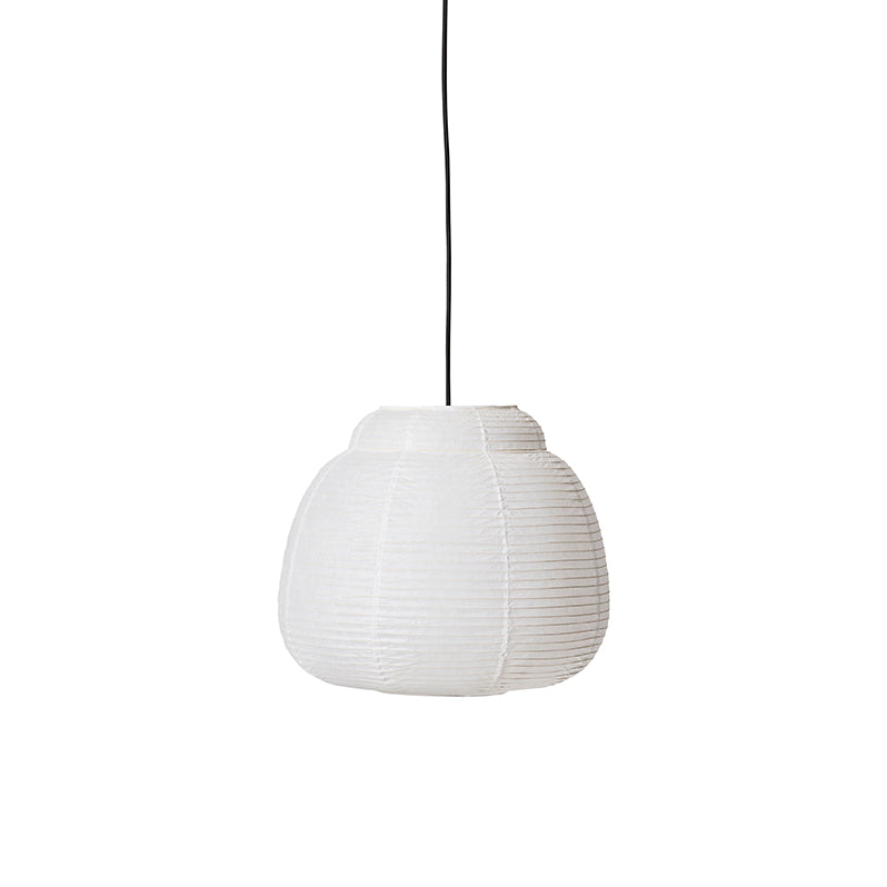 Made by Hand Papier Single Ø40 Pendant Lamp, a minimalist white paper pendant lamp crafted from delicate hand-folded mulberry paper with a distinct ribbed texture and an organic, tiered silhouette. This Scandinavian-style ceiling light, inspired by traditional Japanese lanterns, offers soft, diffused illumination. It's an ideal Japandi lighting fixture for modern living rooms, serene bedrooms, or contemporary dining areas.