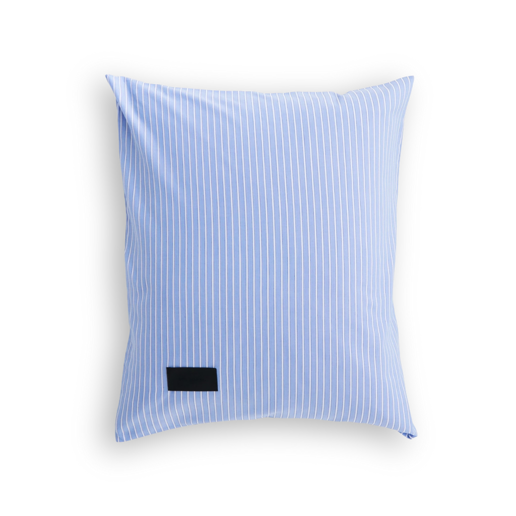 Magniberg Wall Street Pillow Case - Stripe Light Blue Oxford, a sophisticated light blue cotton oxford pillowcase adorned with crisp white vertical stripes, offering a smooth, breathable woven texture.