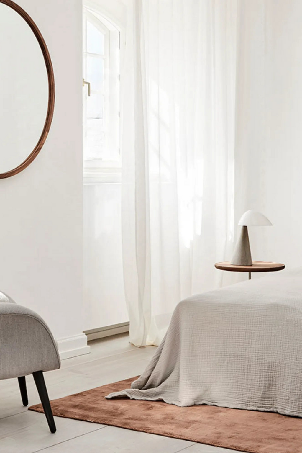 Large bamboo rug with woven pattern and fringe edges