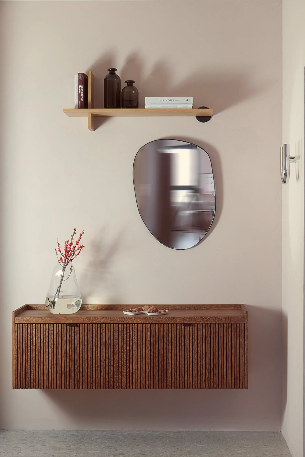 TAMO Meda 2 TV Unit: A modern floating design in rich, medium brown wood with grooved texture, dark pull handles, and a refined tabletop edge. Perfect for contemporary living spaces.