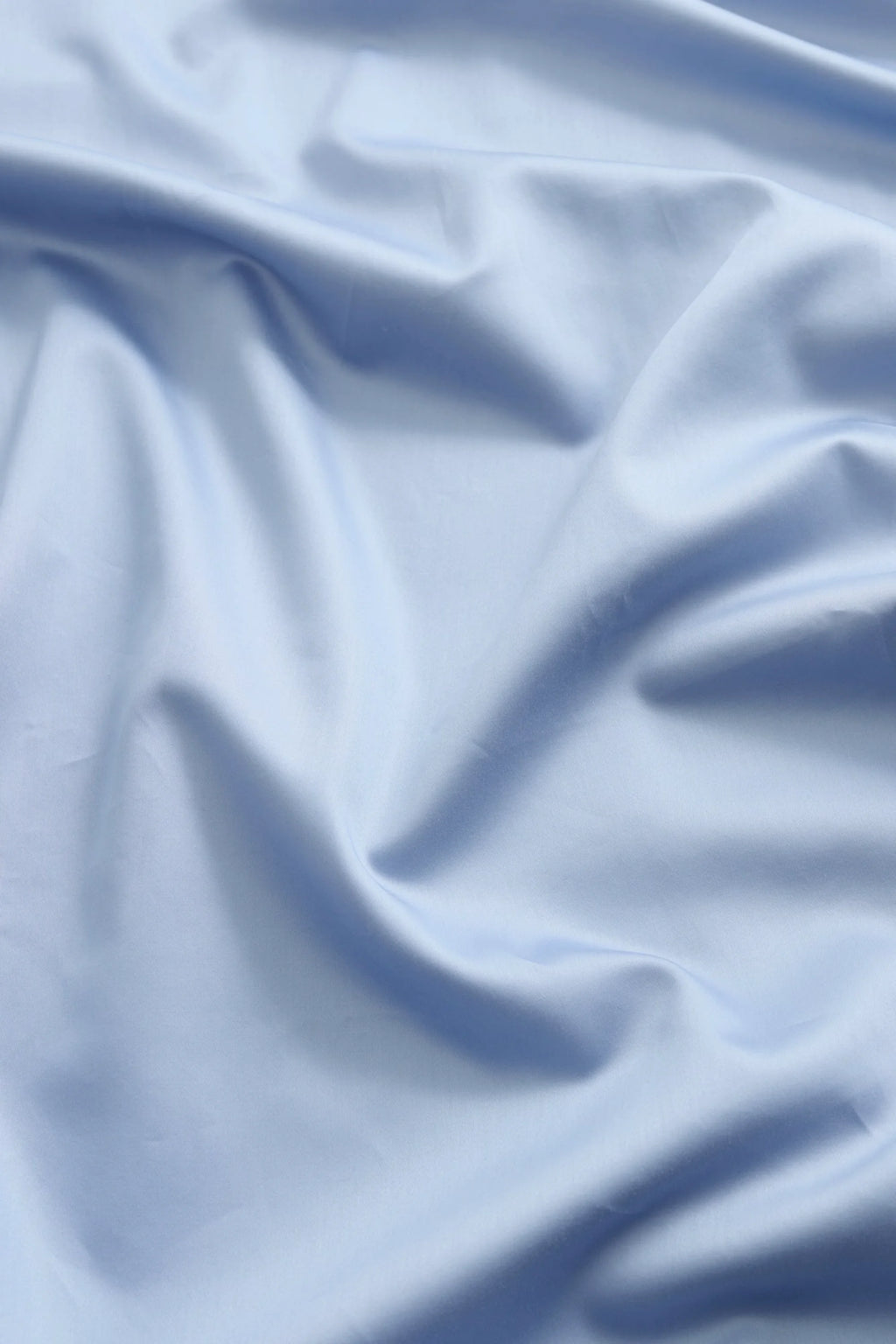 Magniberg Mother Sateen Flat Sheet, a luxurious light blue sateen flat sheet crafted from premium cotton sateen, featuring a smooth, soft texture and subtle sheen with elegant drapes and.